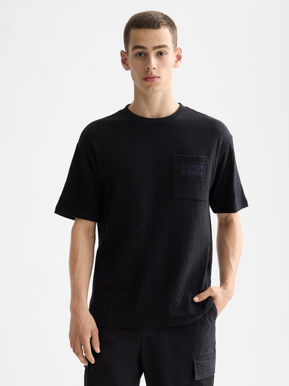 Double face pocket S/S T-shirt by Scotch & Soda featuring a stylish front pocket design on soft cotton fabric.