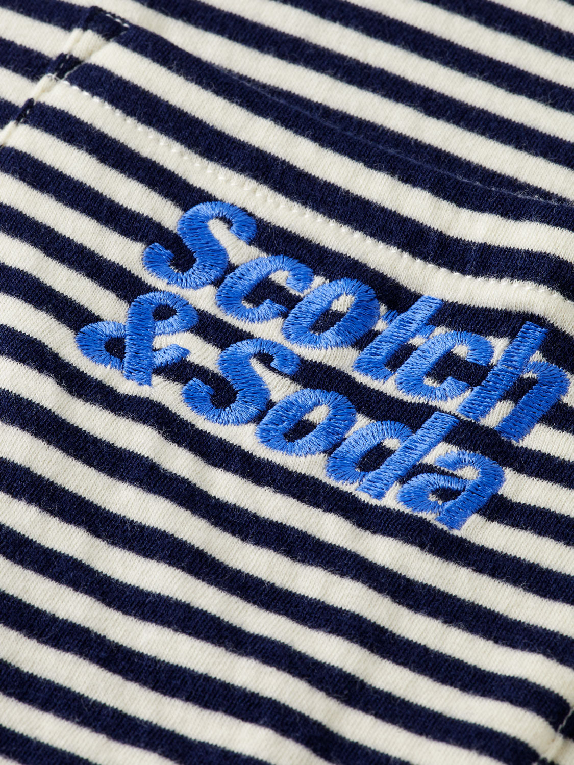 Double face pocket T-shirt by Scotch & Soda, short sleeve tee with dual fabric design and chest pockets.