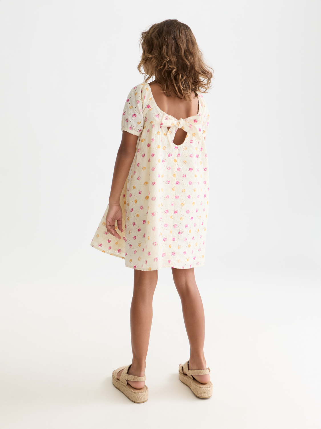 Kids embroidered printed dress by Scotch & Soda, featuring colorful patterns and a soft fabric, shown from the back.