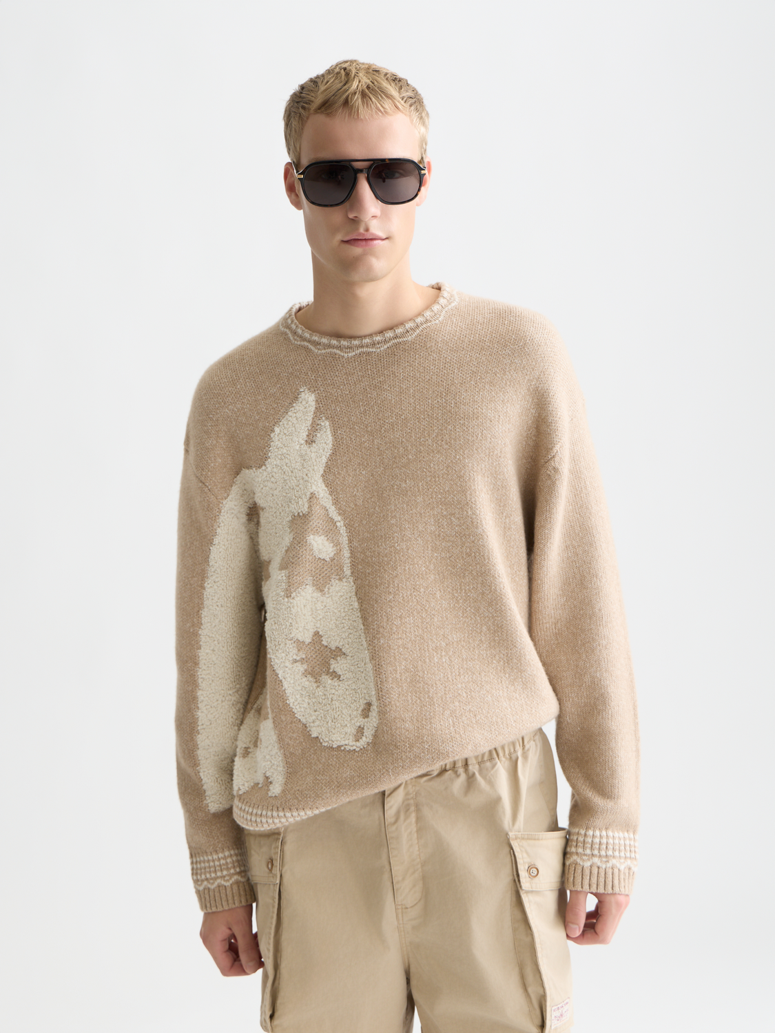 Scotch & Soda jacquard knit pullover featuring intricate woven patterns, soft texture, and a classic crewneck style.