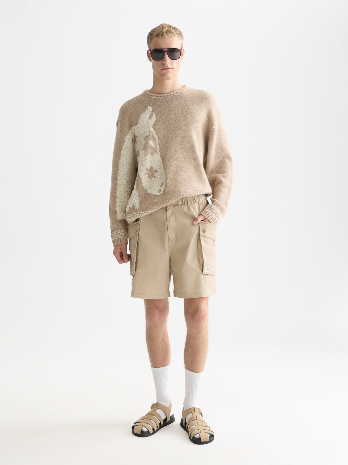 Scotch & Soda jacquard knitwear pullover featuring detailed woven pattern and classic crew neck design.