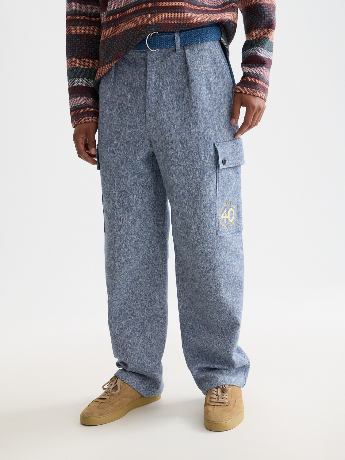 Loose straight-fit cargo pants by Scotch & Soda, beige color, with multiple pockets and relaxed style, front view.