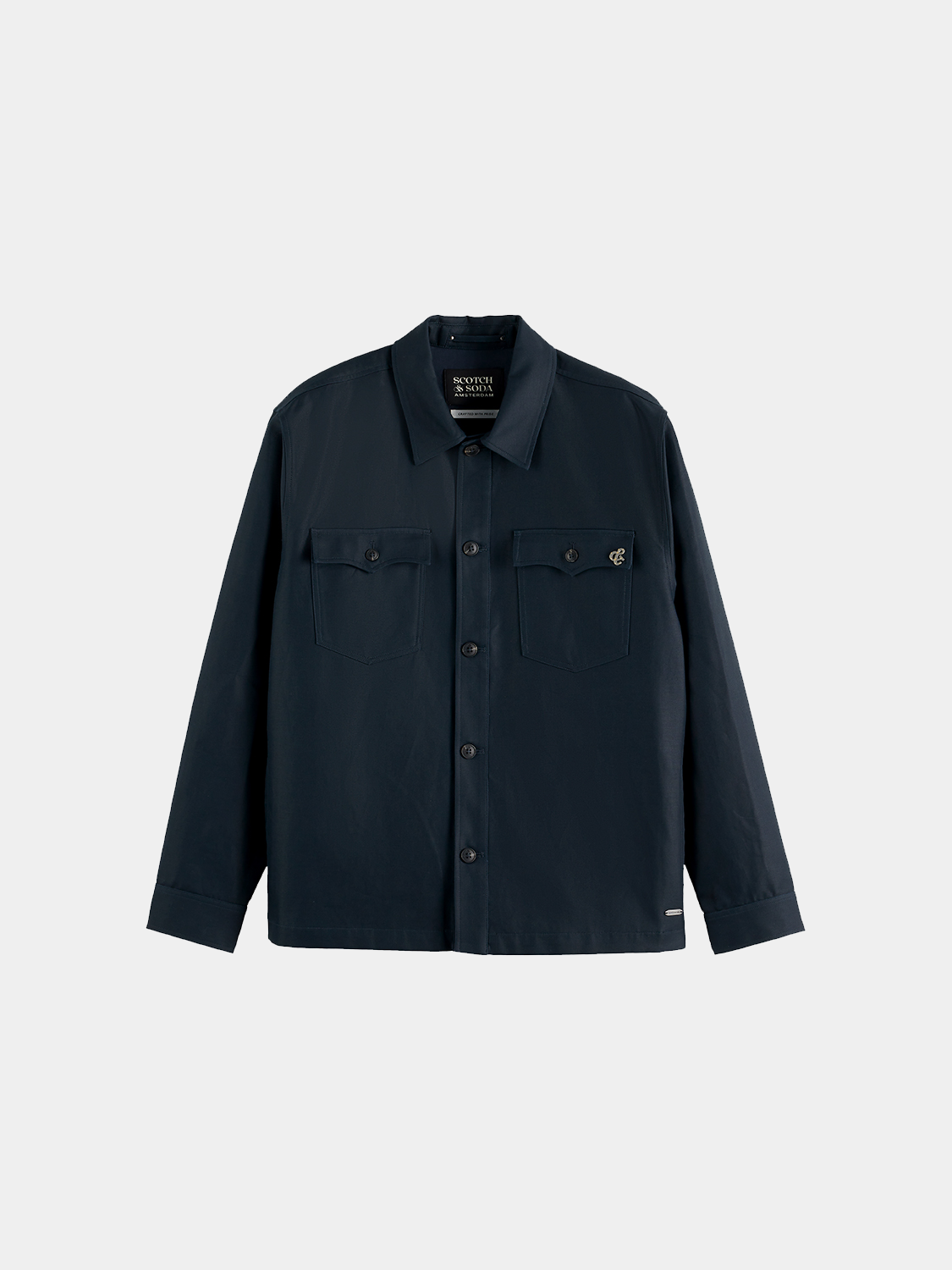 Relaxed-fit SCOTCH & SODA overshirt jacket in neutral fabric, displayed on a hanger.