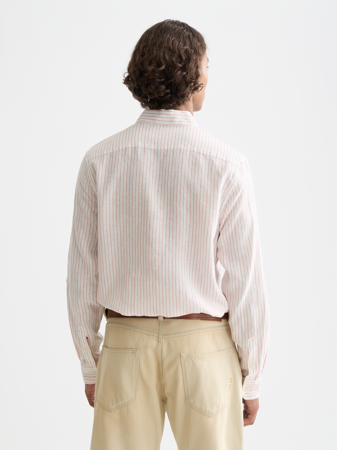 Long-sleeve striped linen shirt by Scotch & Soda with a relaxed fit and classic collar, shown from the back.