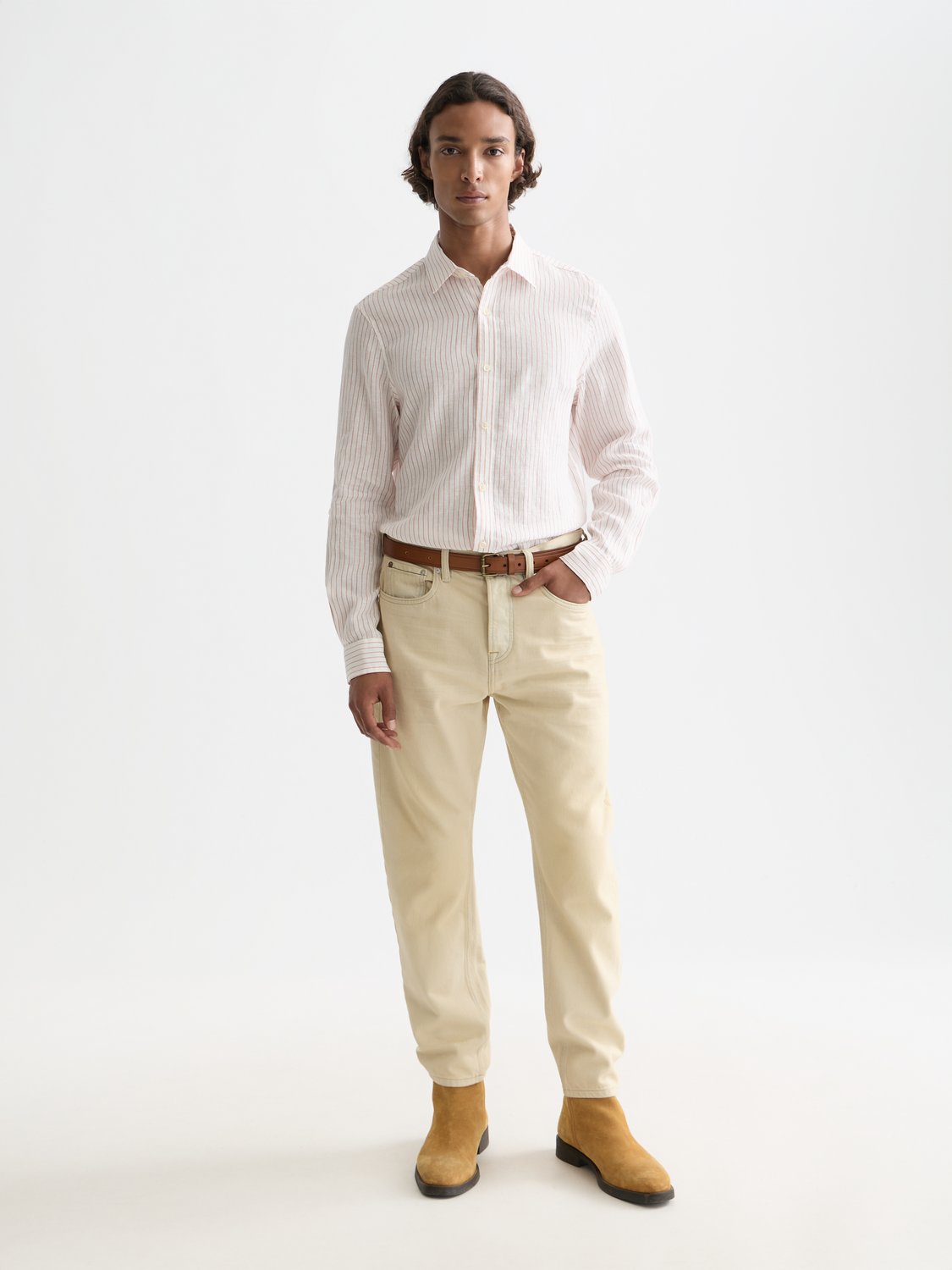 Long-sleeve striped linen shirt by Scotch & Soda, featuring a casual fit and vibrant pattern, perfect for warm weather wear.