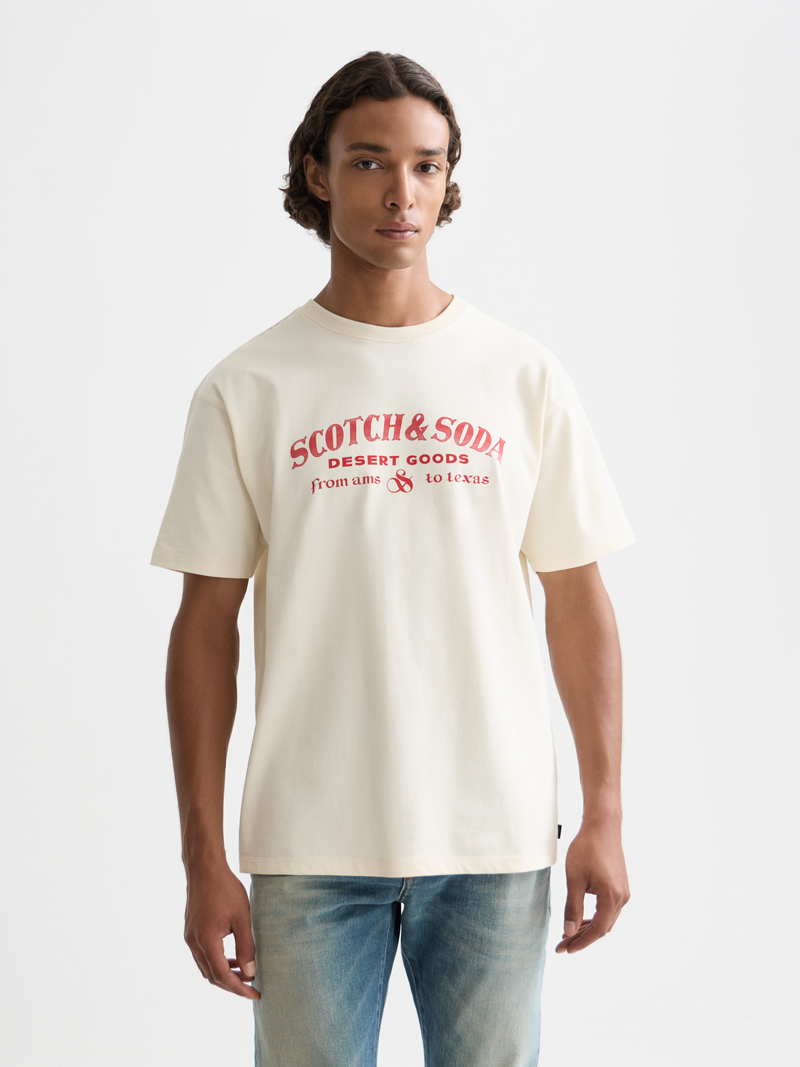Scotch & Soda short sleeve artwork t-shirt with colorful graphic print, casual fit, and round neckline.