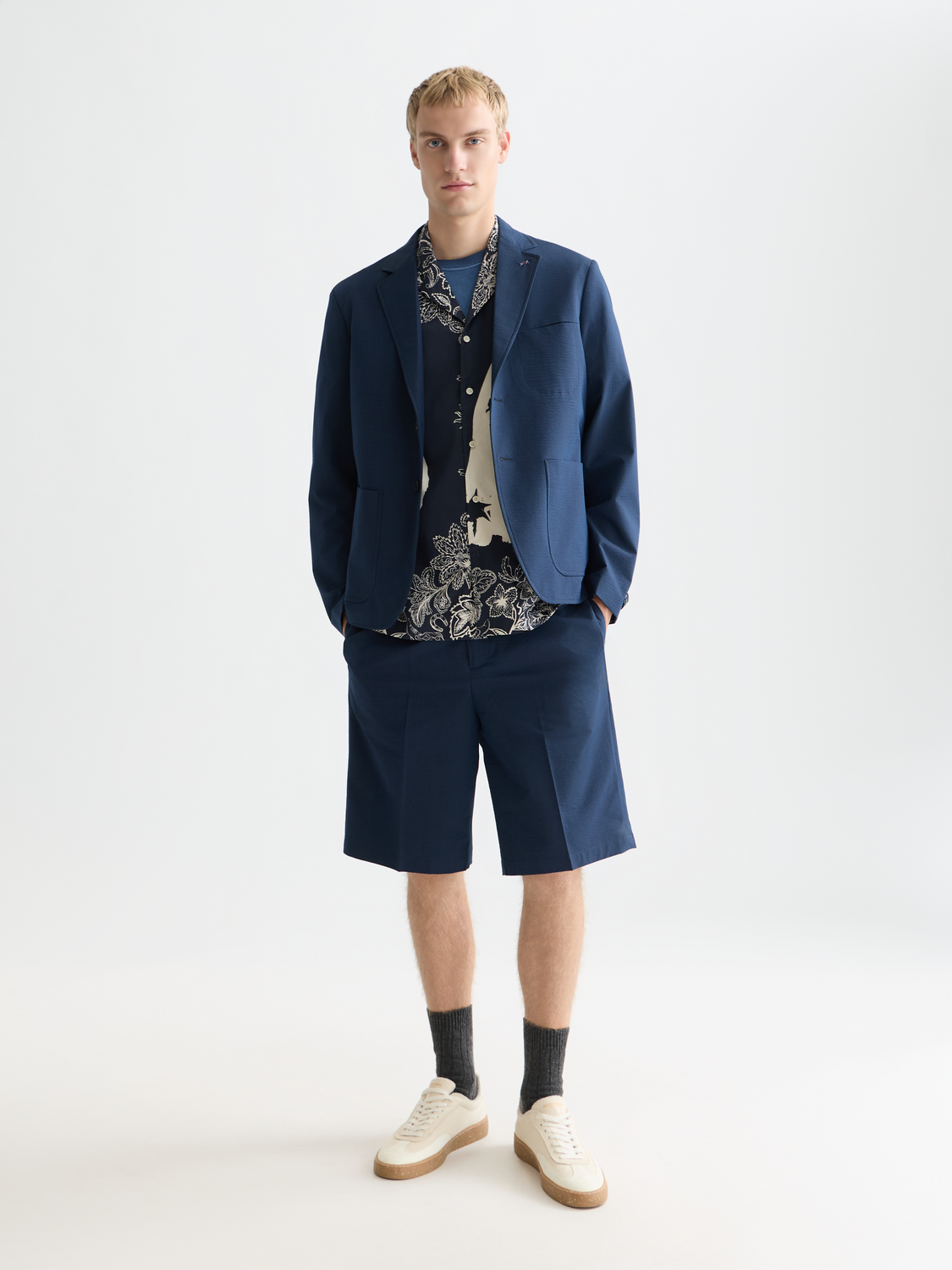 Seersucker shorts by Scotch & Soda with a classic striped pattern, featuring a relaxed fit and side pockets.