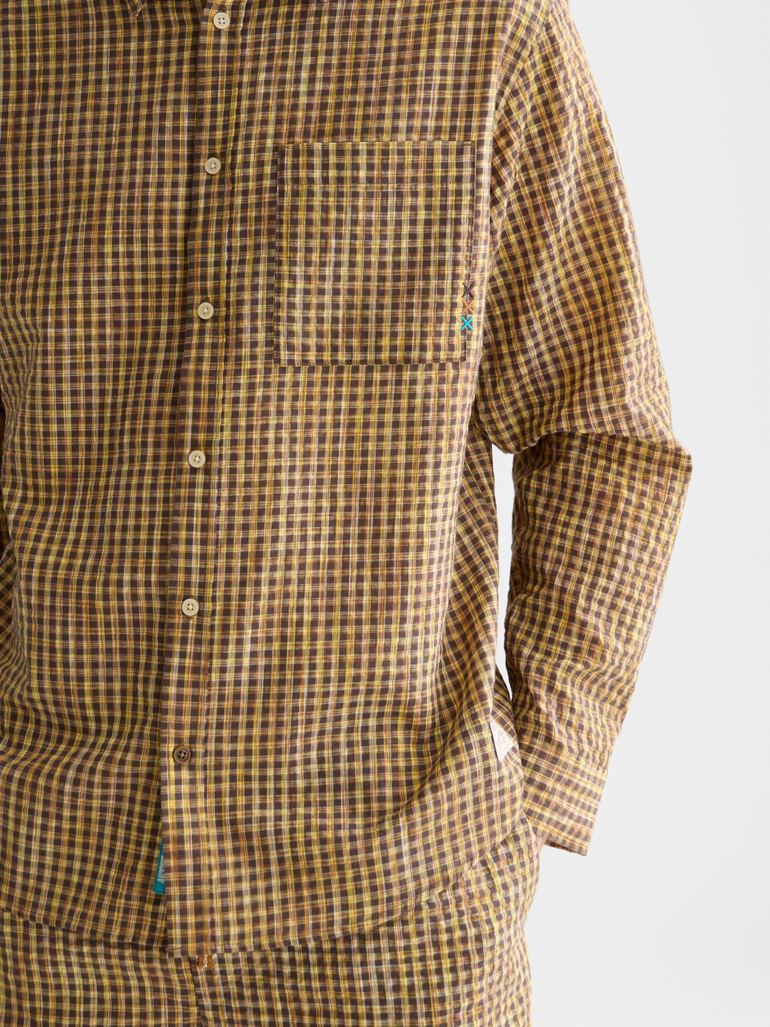 Blue Scotch & Soda seersucker micro-check long-sleeve shirt with a collar and button closure, shown flat on a white background.