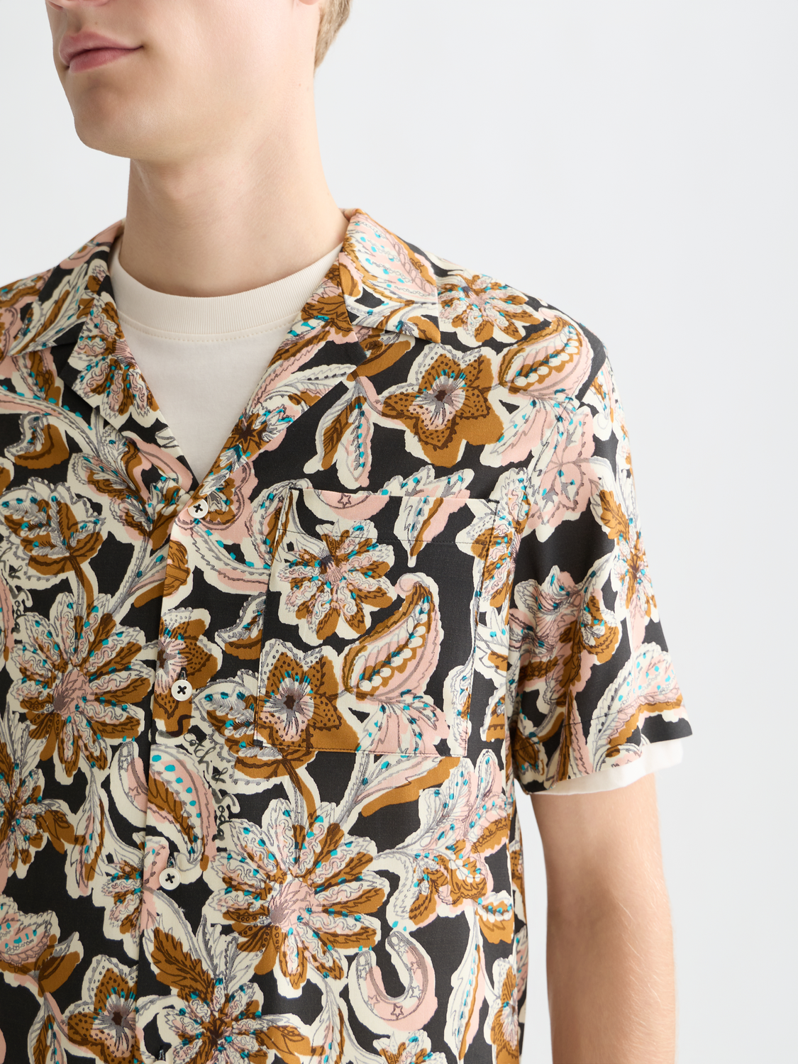 Printed short-sleeved shirt by Scotch & Soda with vibrant floral pattern, casual fit, and classic collar.