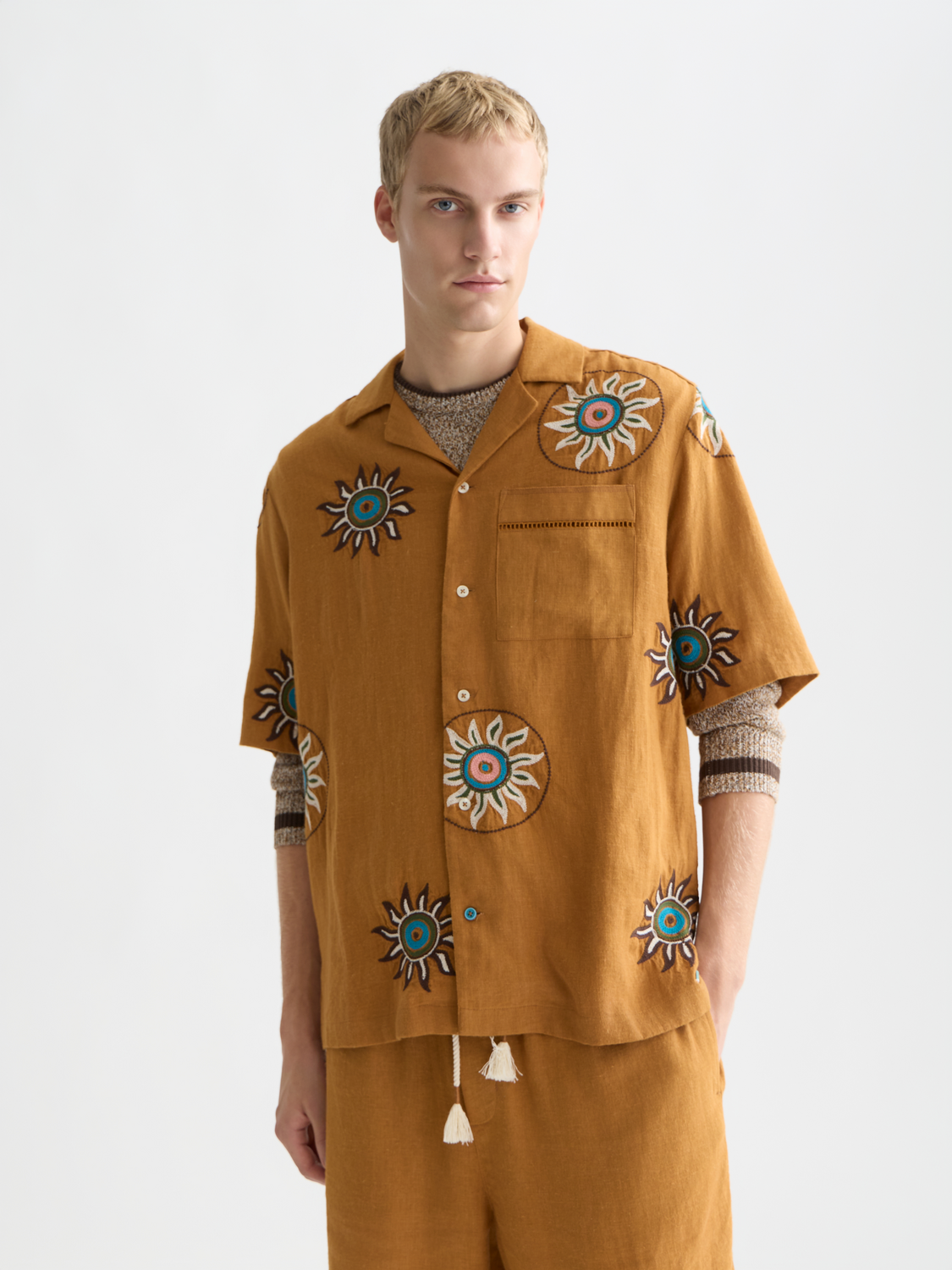 Embroidered linen short-sleeved shirt by Scotch & Soda, featuring intricate embroidery on lightweight linen fabric.