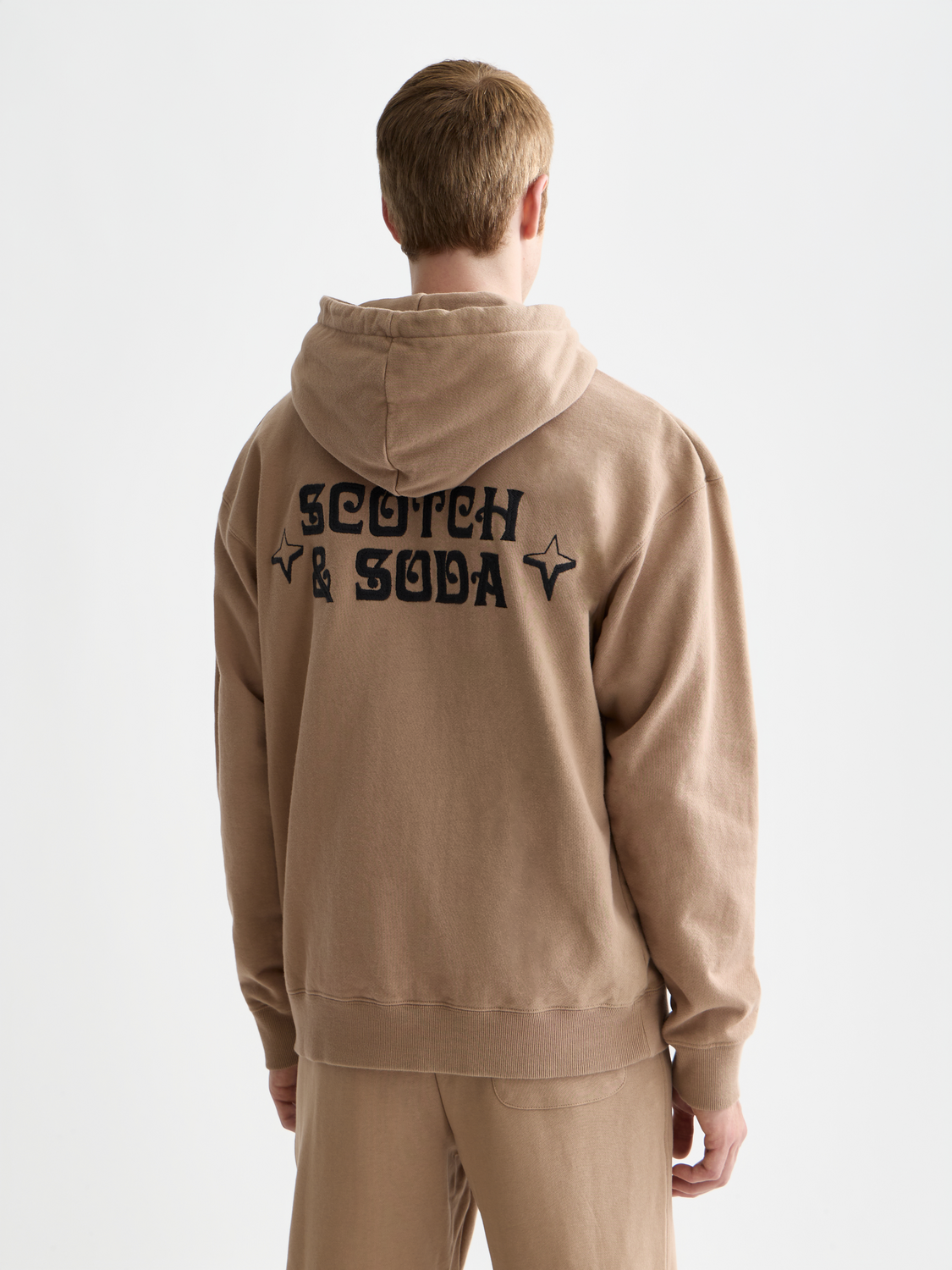 Embroidered hoodie from Scotch & Soda, cozy sweats with detailed embroidery on the back, in a casual, stylish design.