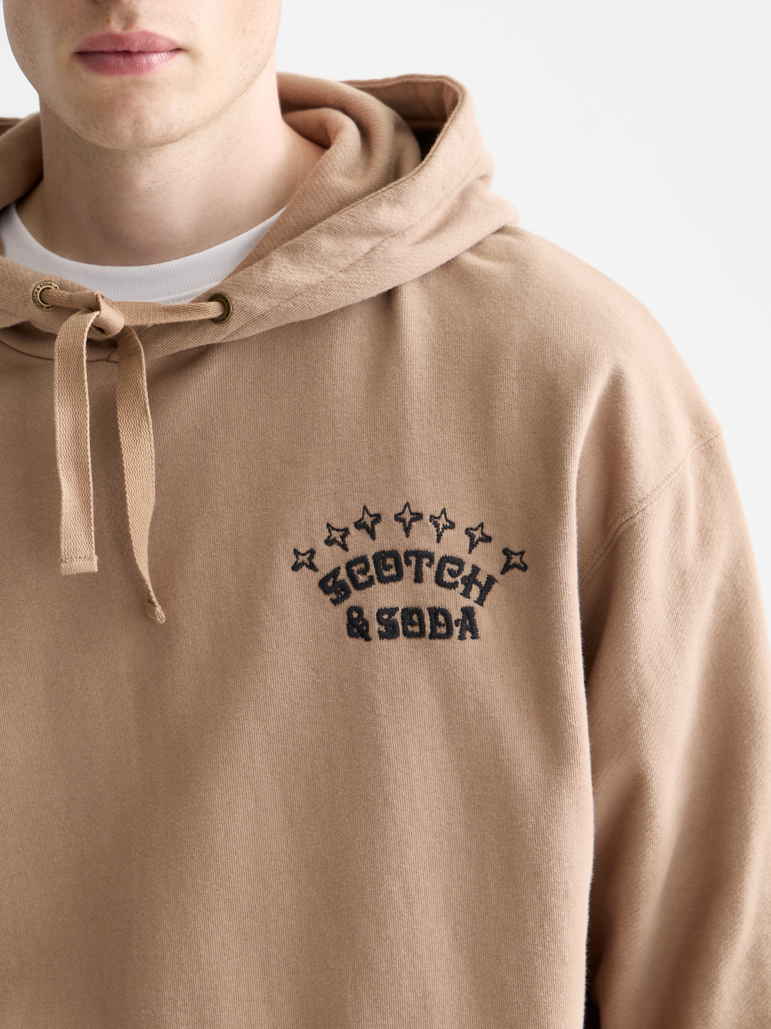 Embroidered hoodie from SCOTCH & SODA, soft sweats with detailed embroidery, casual fit, and cozy fabric.