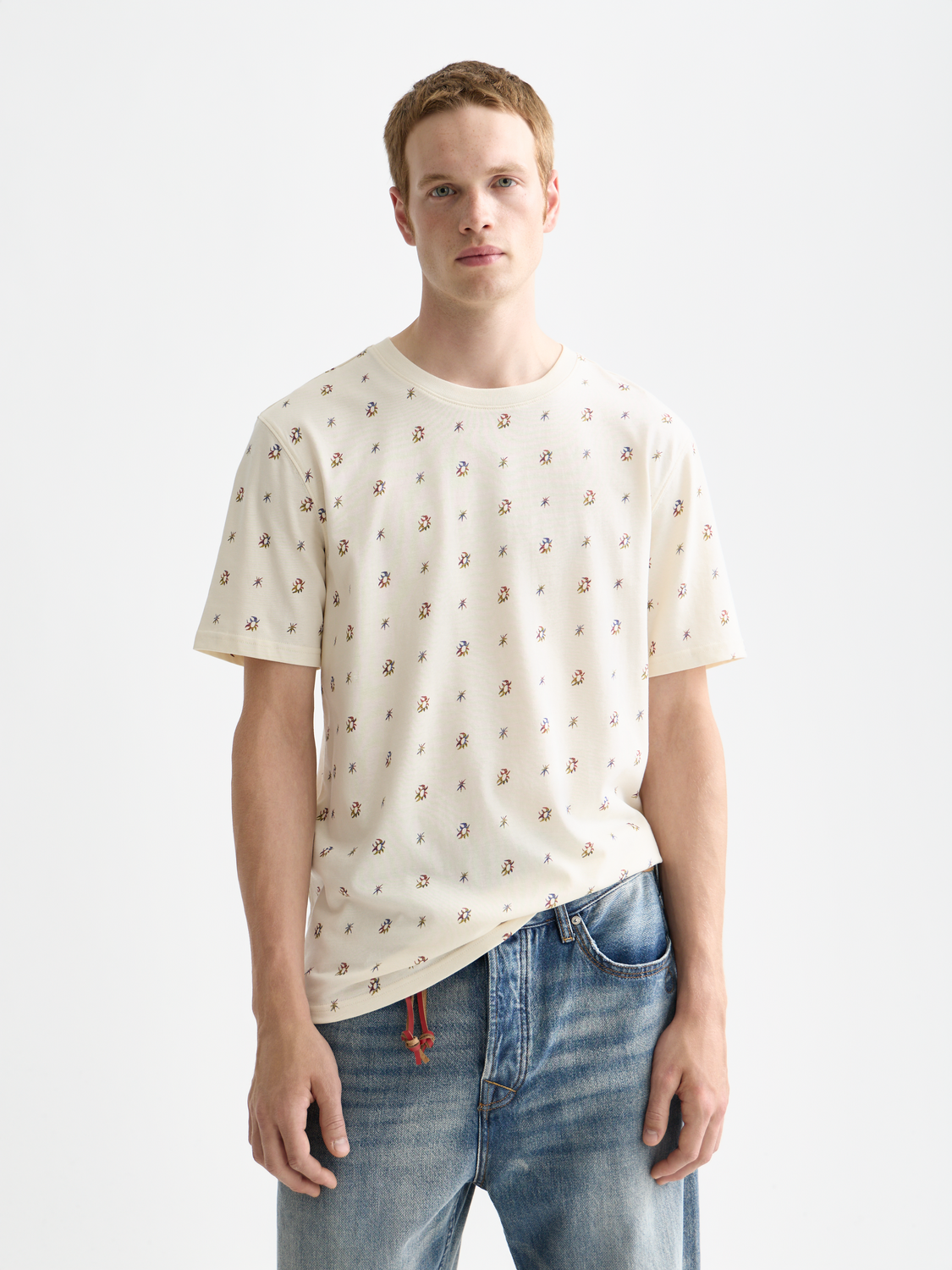 Printed Scotch & Soda short-sleeve T-shirt with colorful graphic design on front, casual men's summer tee.