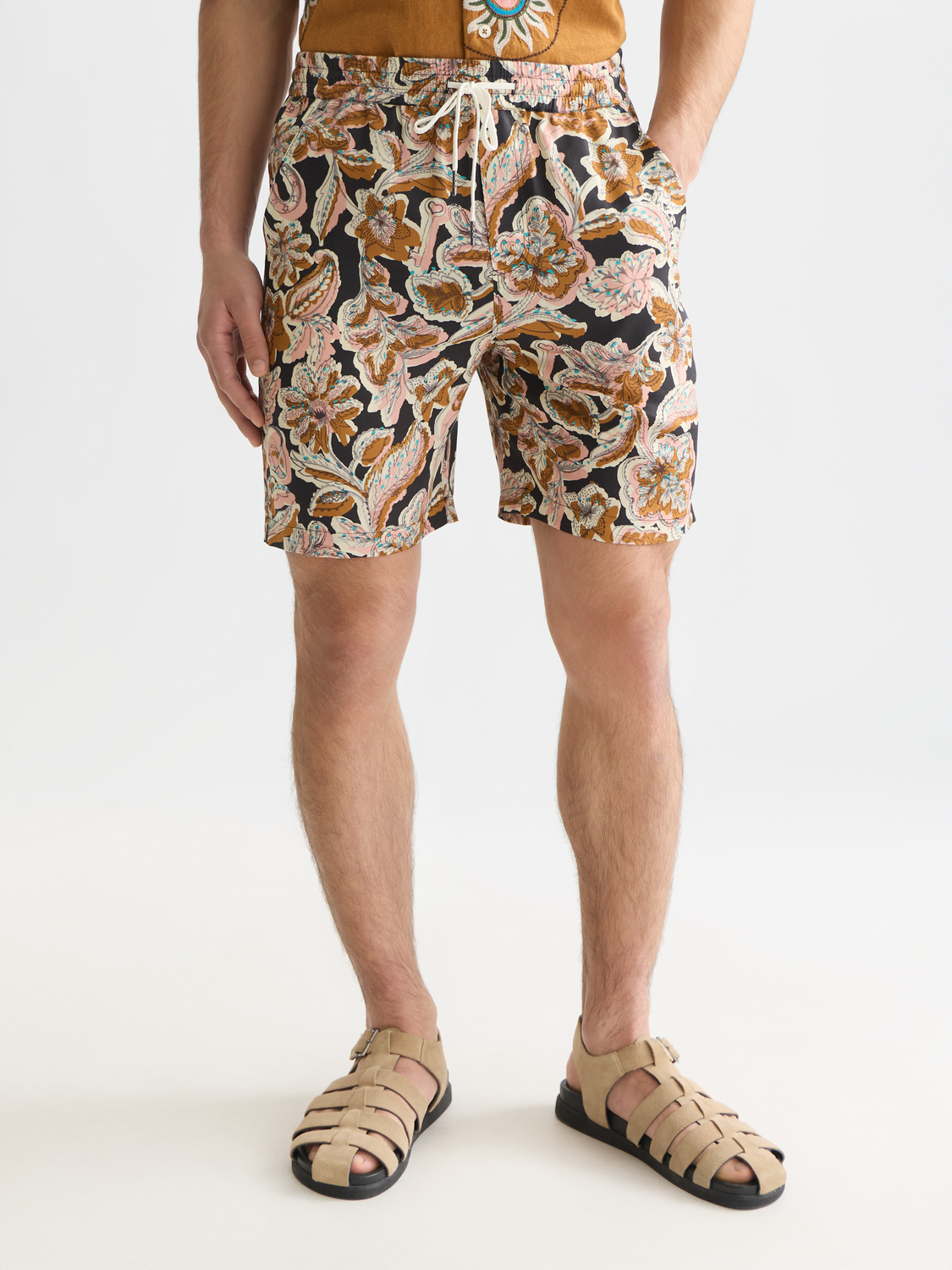 Printed shorts by Scotch & Soda featuring a vibrant colorful pattern, casual fit, perfect for summer wear.