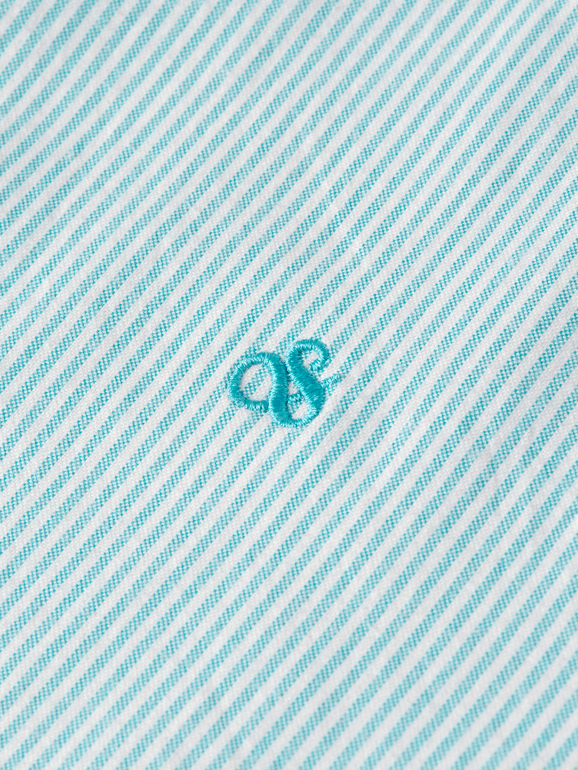Men's striped Oxford shirt by Scotch & Soda, long sleeve button-up with blue and white vertical stripes displayed on a hanger.
