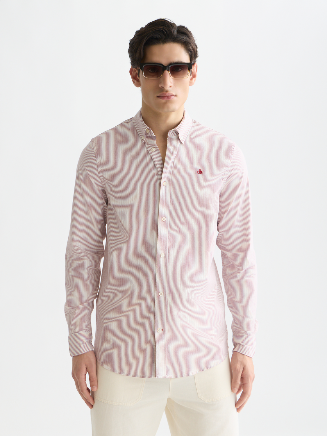 Long sleeve striped Oxford shirt by Scotch & Soda, featuring a classic collar and button front in blue and white.
