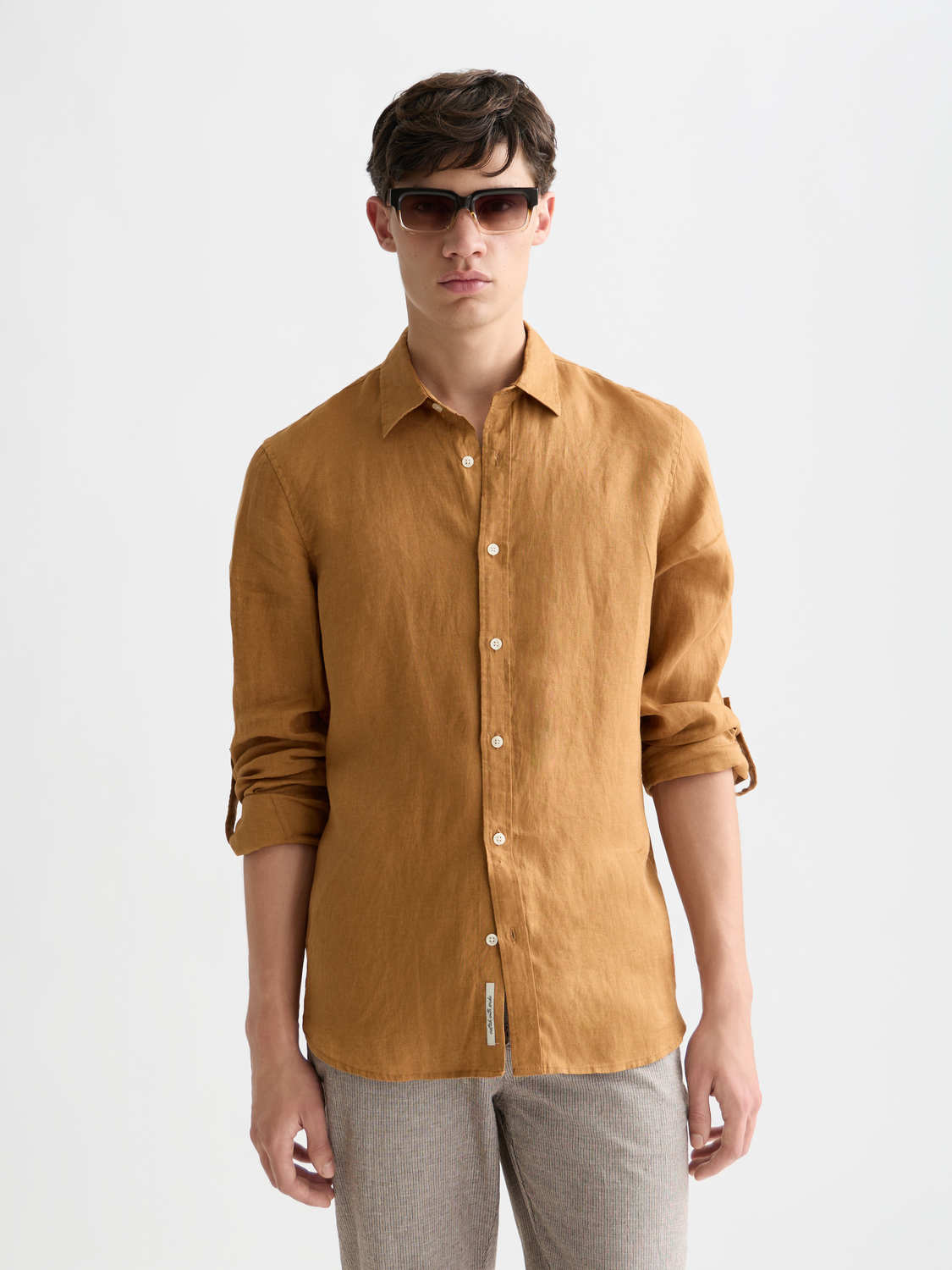 Long sleeve linen shirt from Scotch & Soda featuring a classic collar and relaxed fit, shown in a light, breathable fabric.