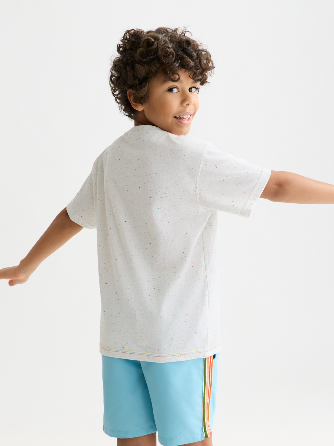 Kids' short-sleeve artwork T-shirt by Scotch & Soda featuring colorful graphic design on the back.