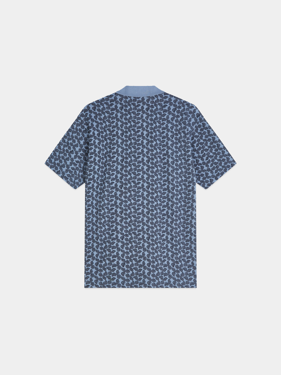 Black printed polo shirt by Scotch & Soda featuring a stylish design and classic fit.