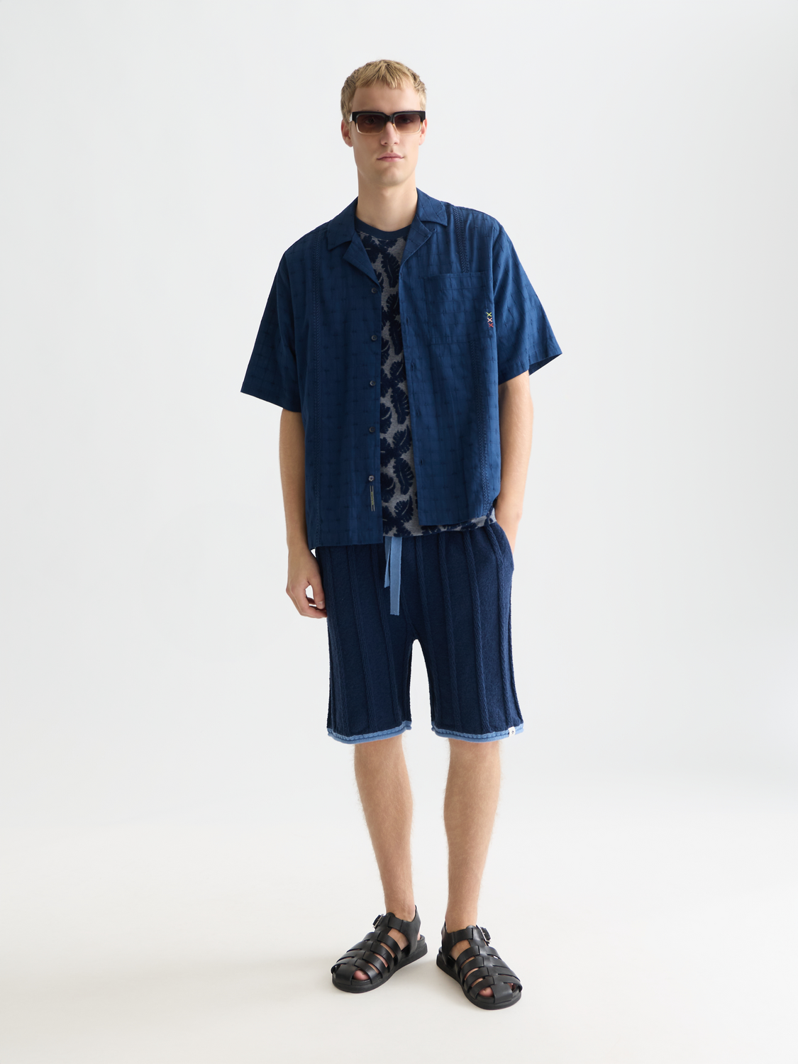 Knitted shorts by Scotch & Soda with a cozy, textured fabric, displayed on a neutral background.