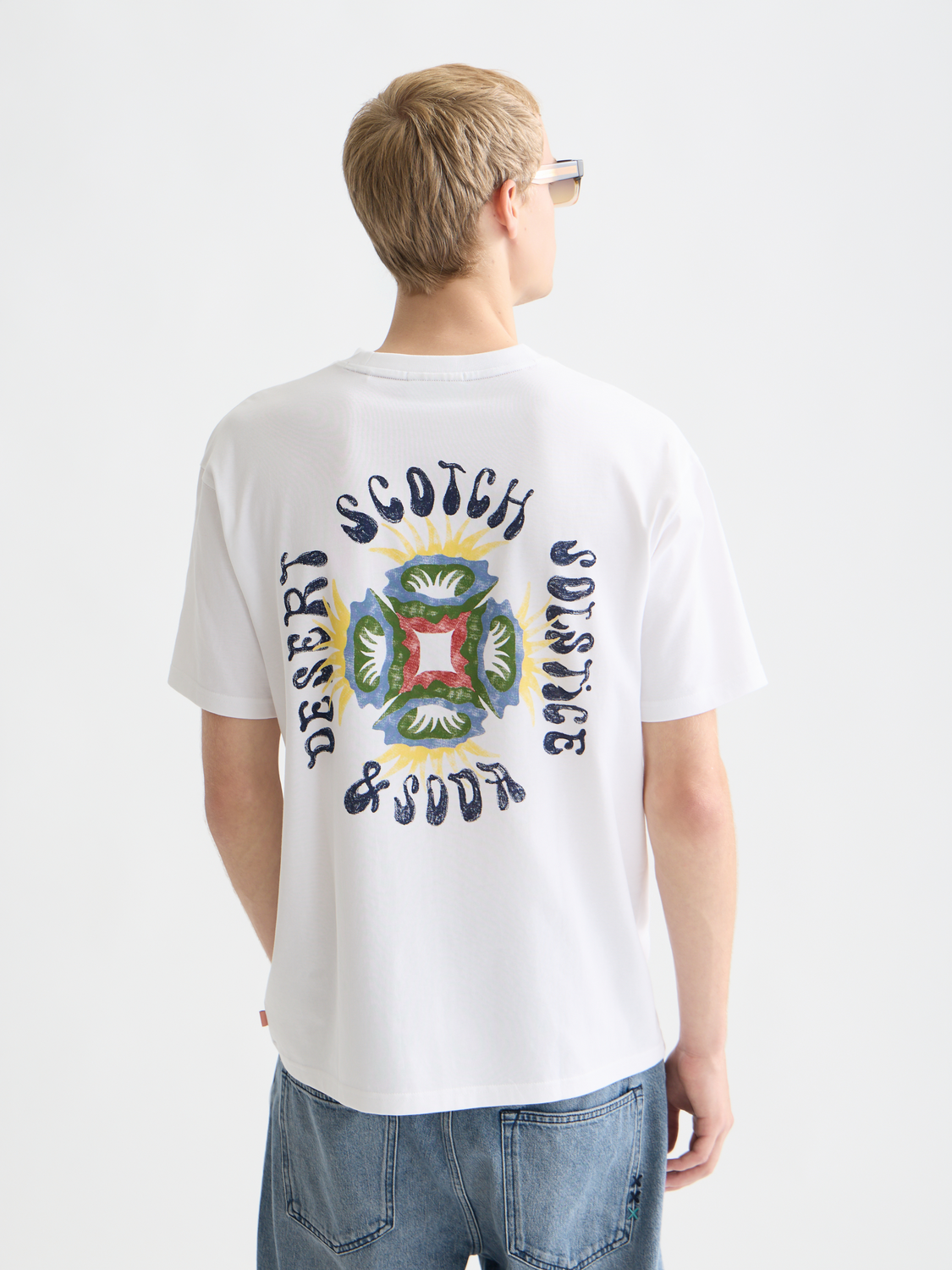 Scotch & Soda short sleeve artwork t-shirt featuring a colorful graphic design on the front.