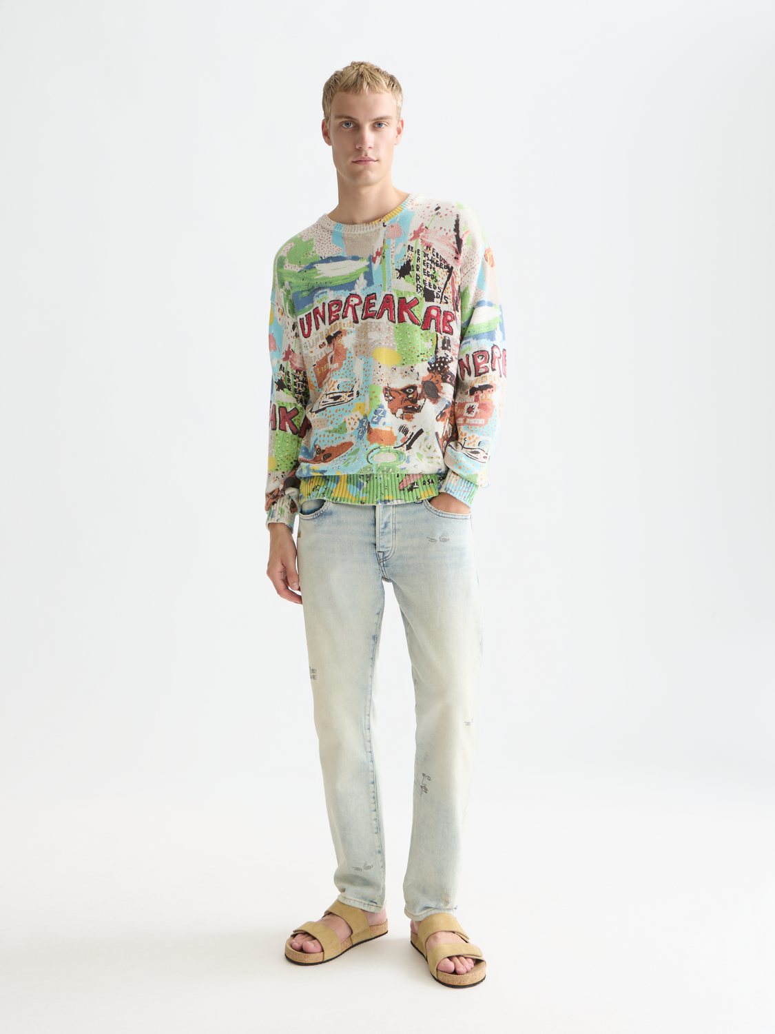 SCOTCH & SODA S&S x Basquiat printed knitwear pullover featuring colorful Basquiat artwork design.