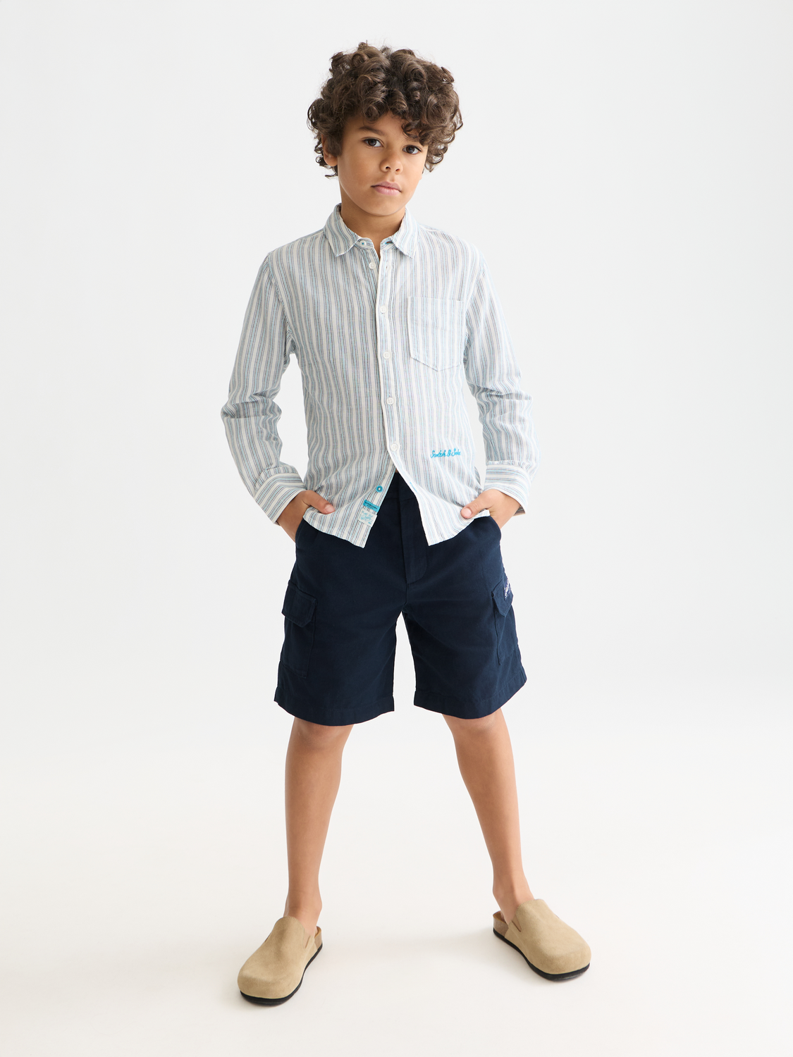 Kids cargo shorts by Scotch & Soda featuring multiple pockets and a relaxed fit, shown in a front view.