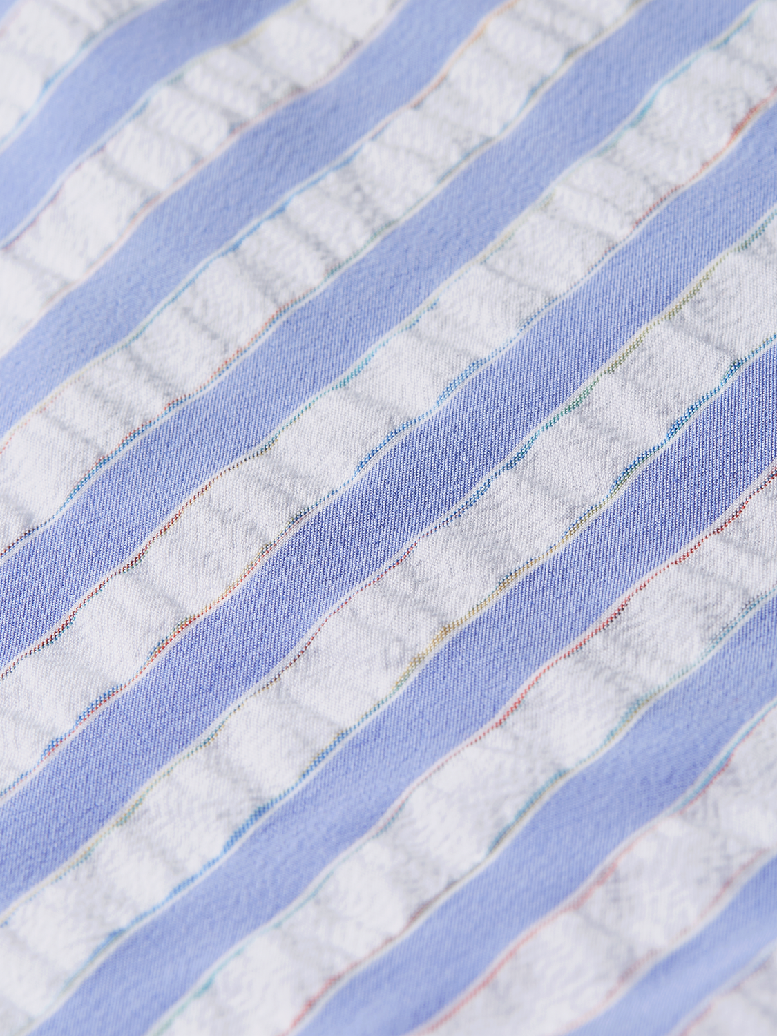 Striped mid-length swimshorts by SCOTCH & SODA with blue, white, and red horizontal stripes, tailored for comfortable beachwear.