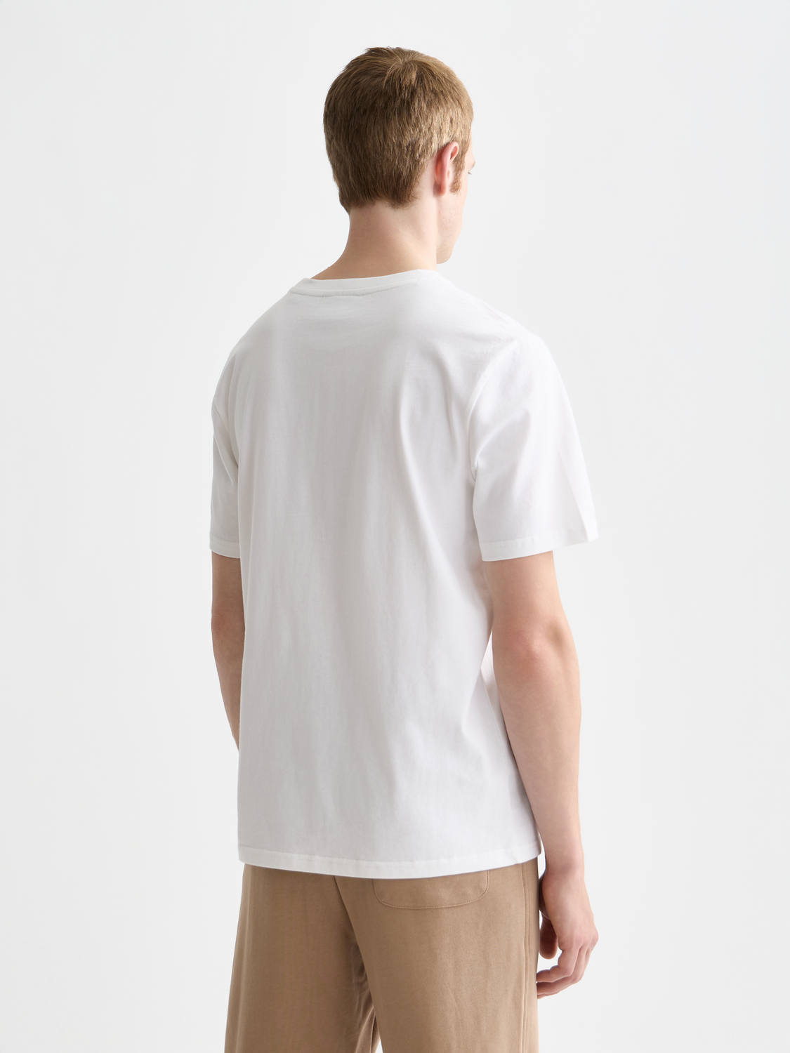 Black short-sleeve Scotch & Soda logo T-shirt with front graphic design, casual crew neck for men.