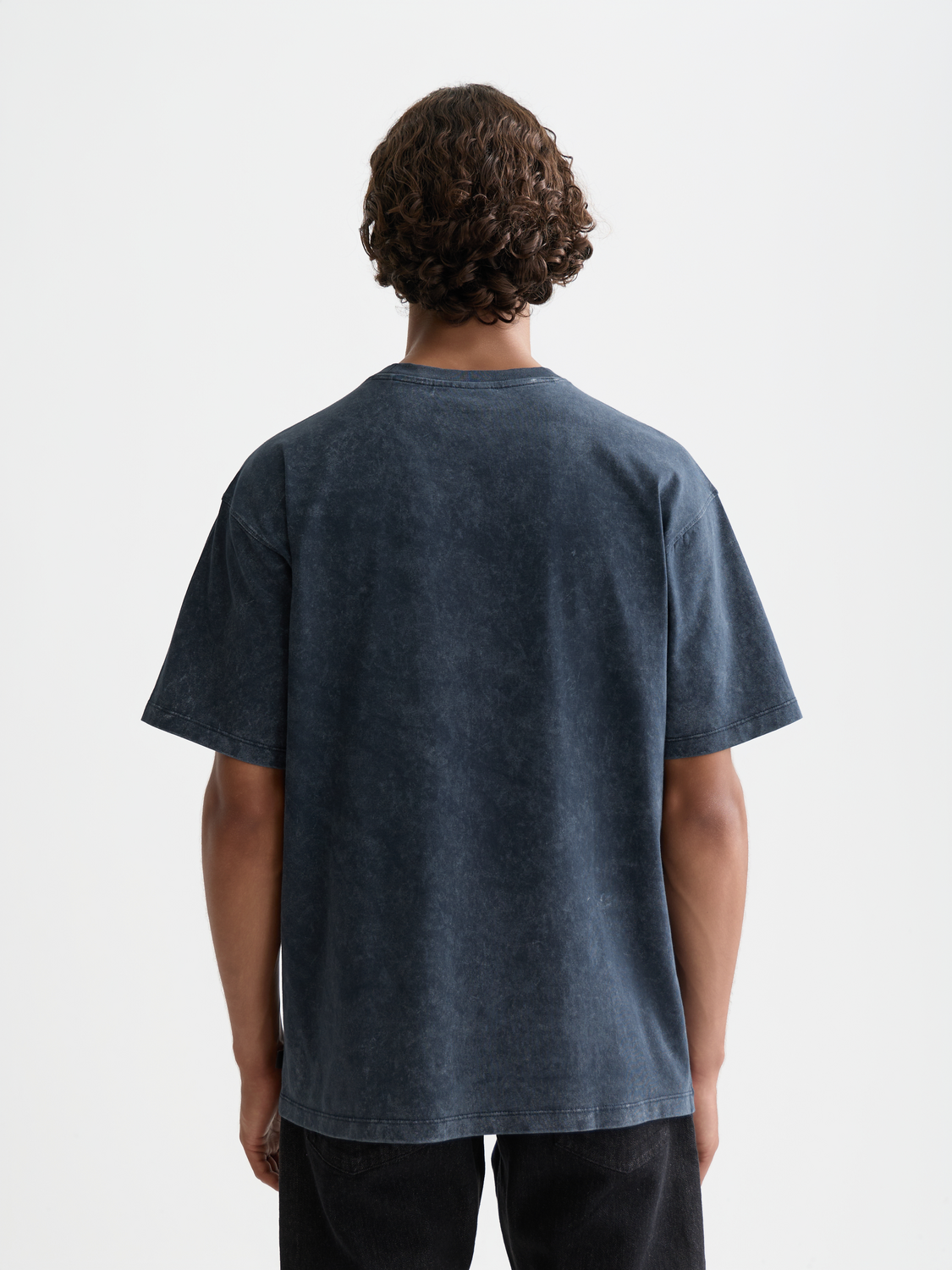 Washed artwork T-shirt from Scotch & Soda, short sleeve men's tee with faded graphic design, black color.