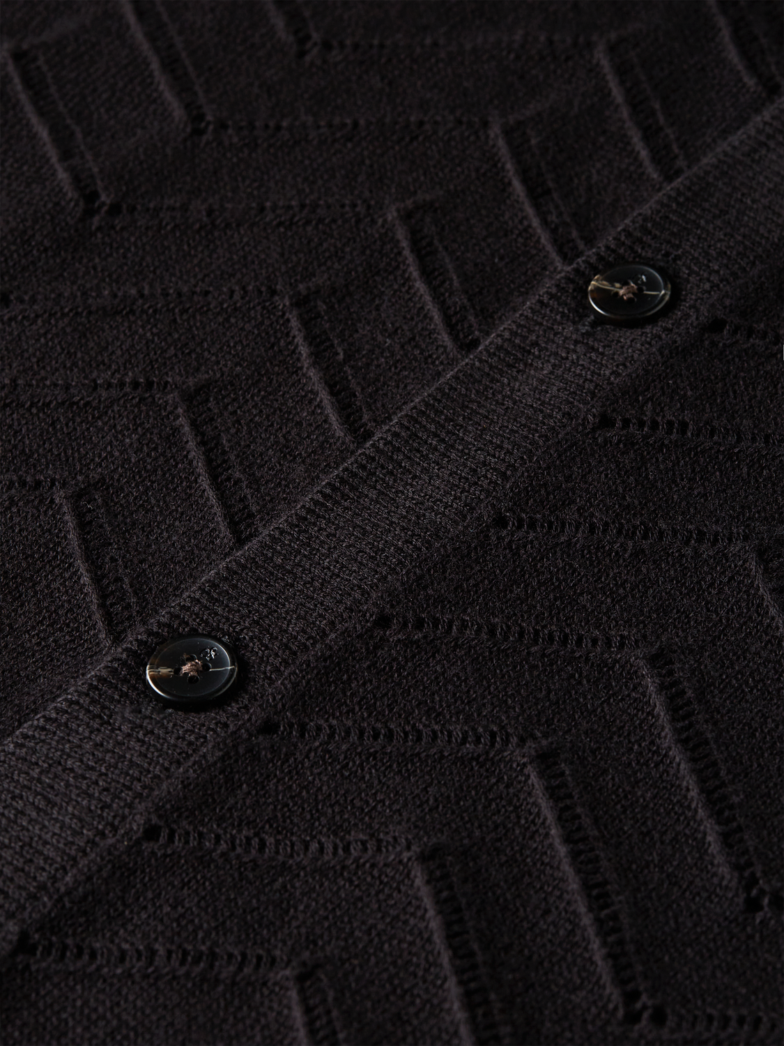Pointelle knit cardigan by Scotch & Soda, featuring delicate openwork pattern and cozy long sleeves.