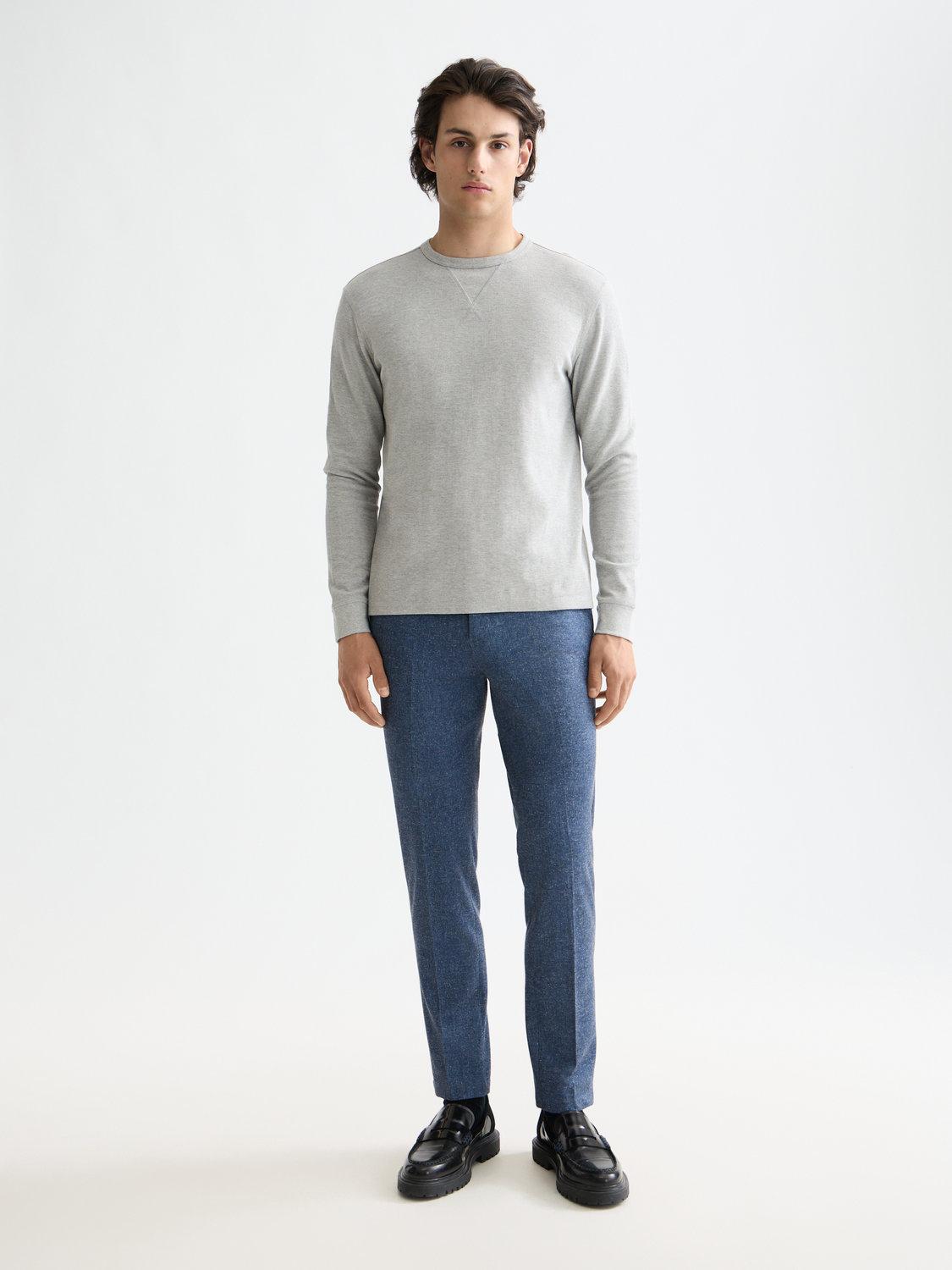 Scotch & Soda Stuart slim-fit chinos pants in classic beige with front pockets and belt loops, casual men's clothing.