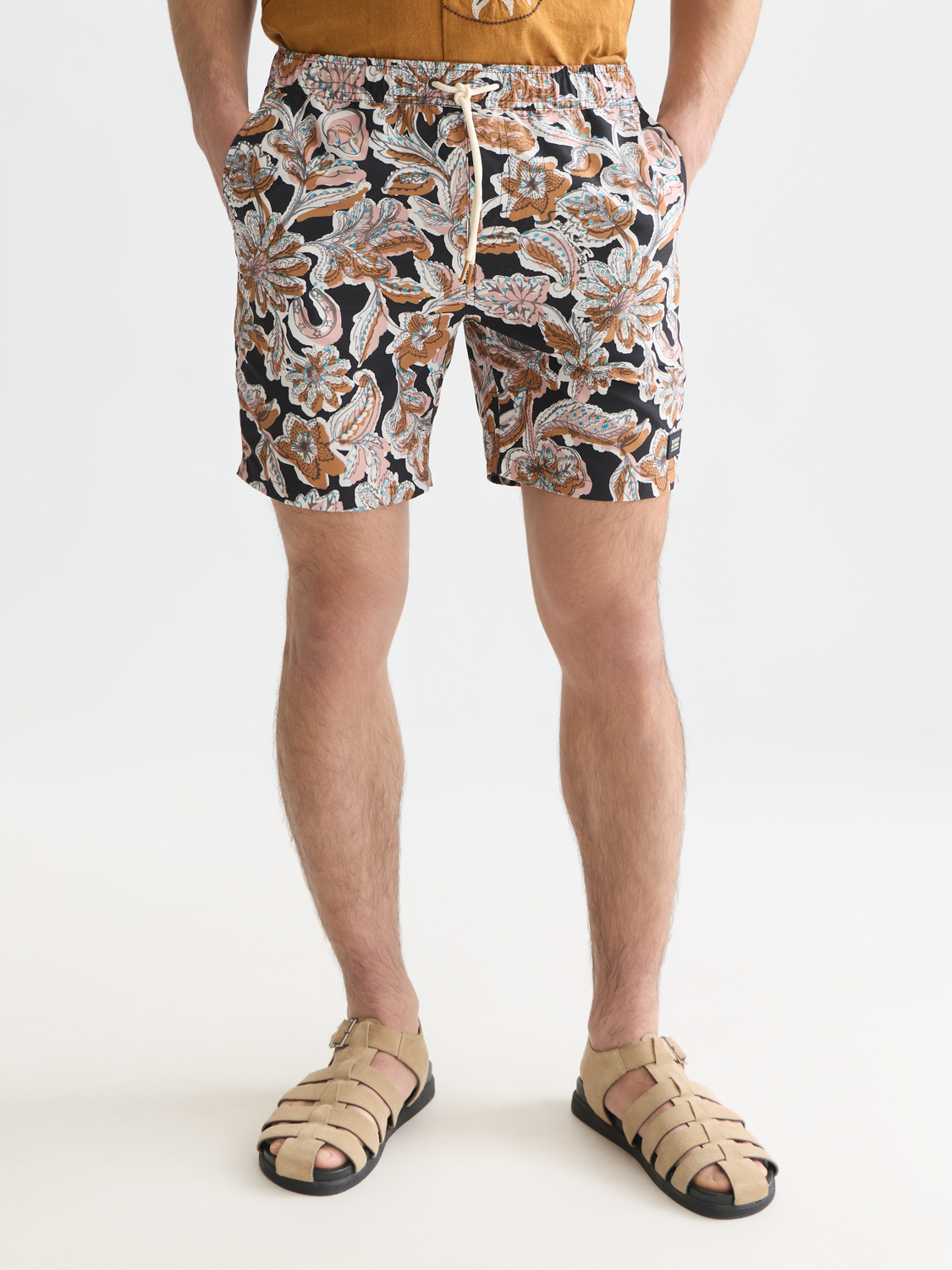 Printed swimshorts by Scotch & Soda, stylish men's swimwear with vibrant pattern, featuring a comfortable fit and elastic waistband.