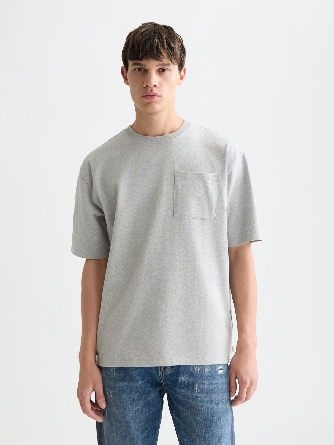 Blue short-sleeve Scotch & Soda chest pocket t-shirt with front pocket detail, casual fit, and soft cotton fabric.