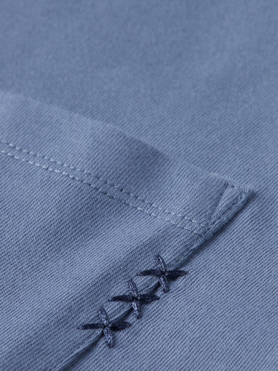 Light blue Scotch & Soda short sleeve t-shirt with chest pocket, casual men's top, made from soft cotton fabric.