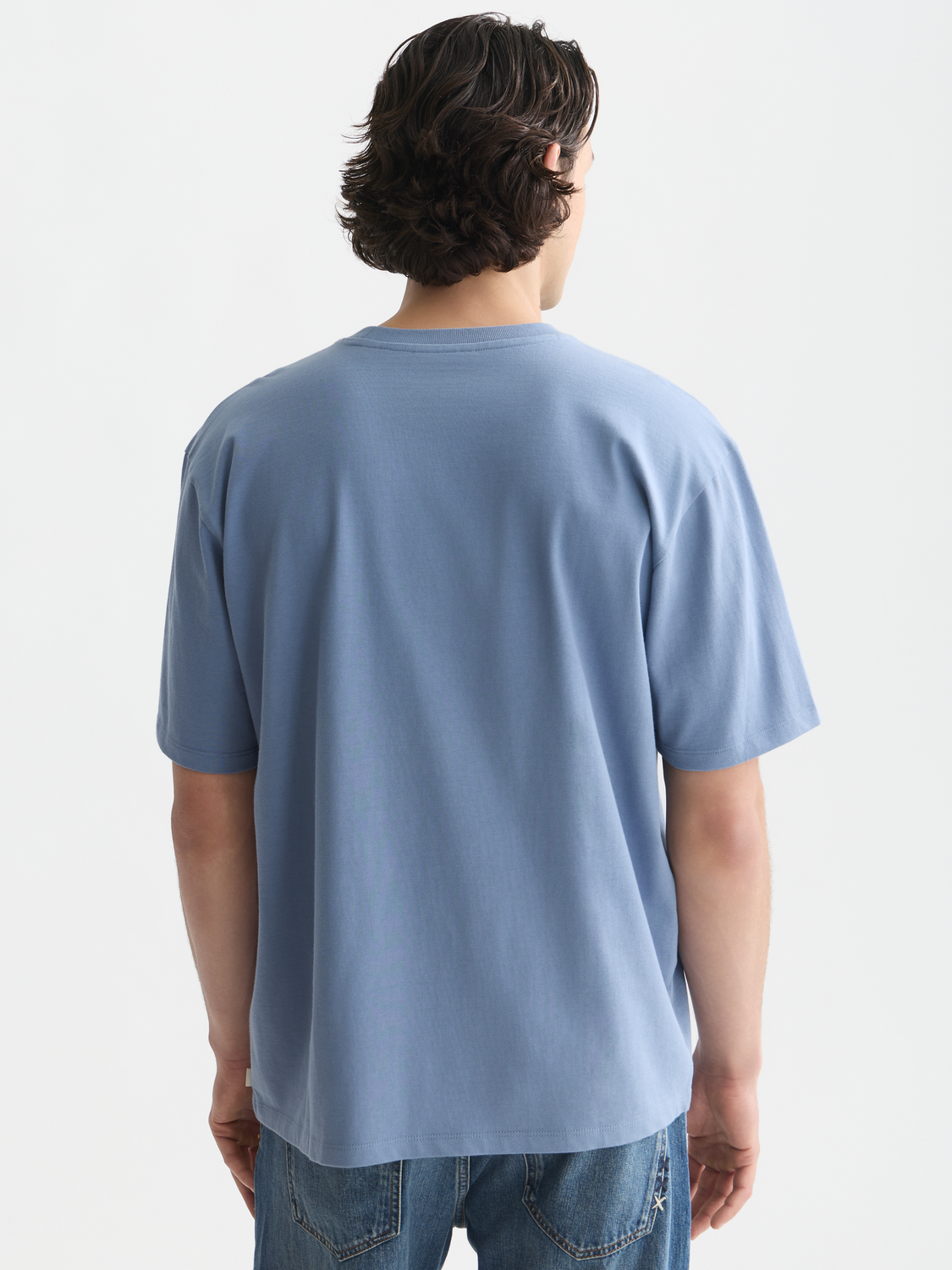 Short sleeve Scotch & Soda chest pocket t-shirt with a classic design and front chest pocket, shown from the back.
