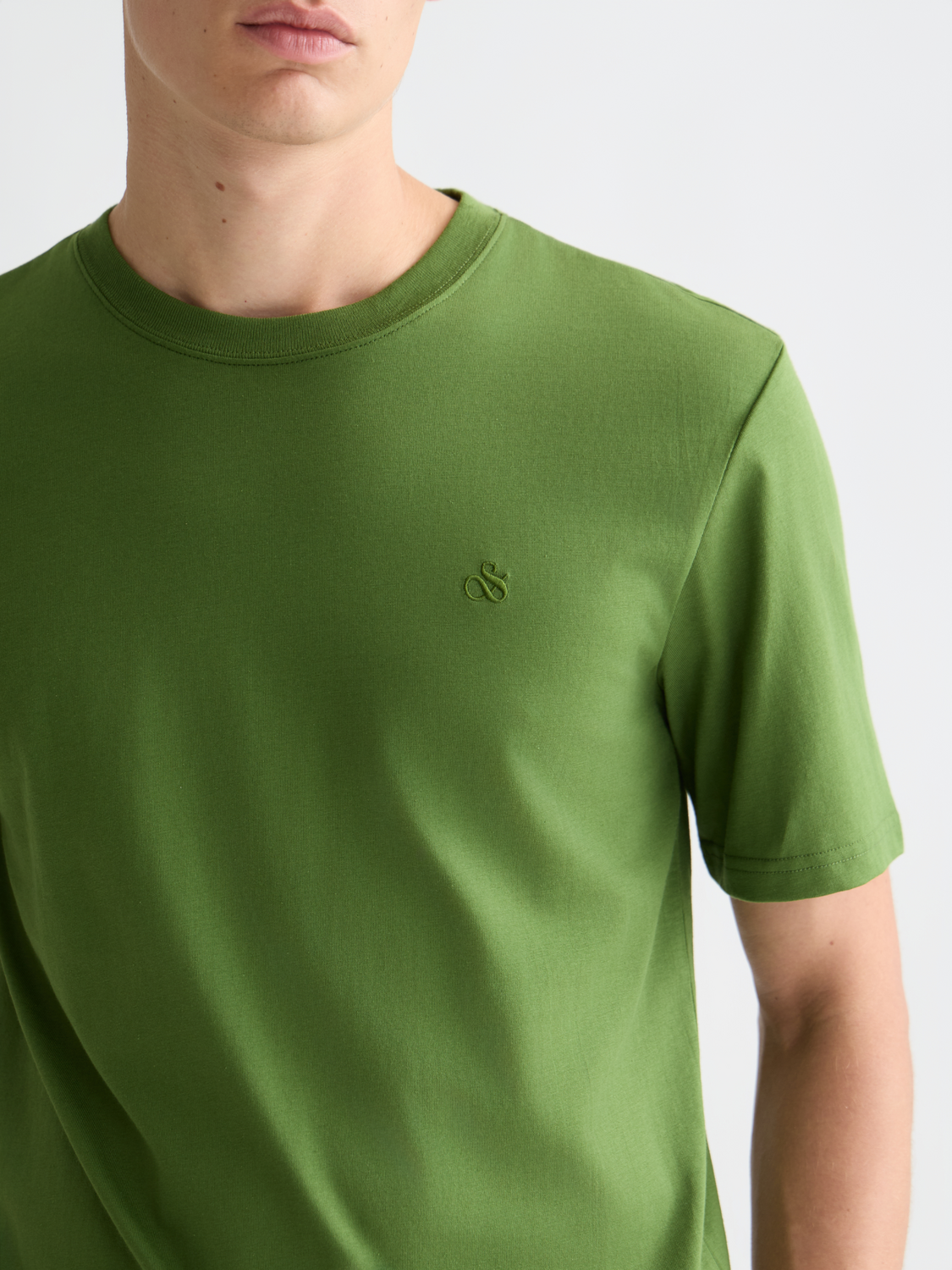 Short sleeve logo t-shirt by Scotch & Soda featuring a graphic logo design on soft cotton fabric.