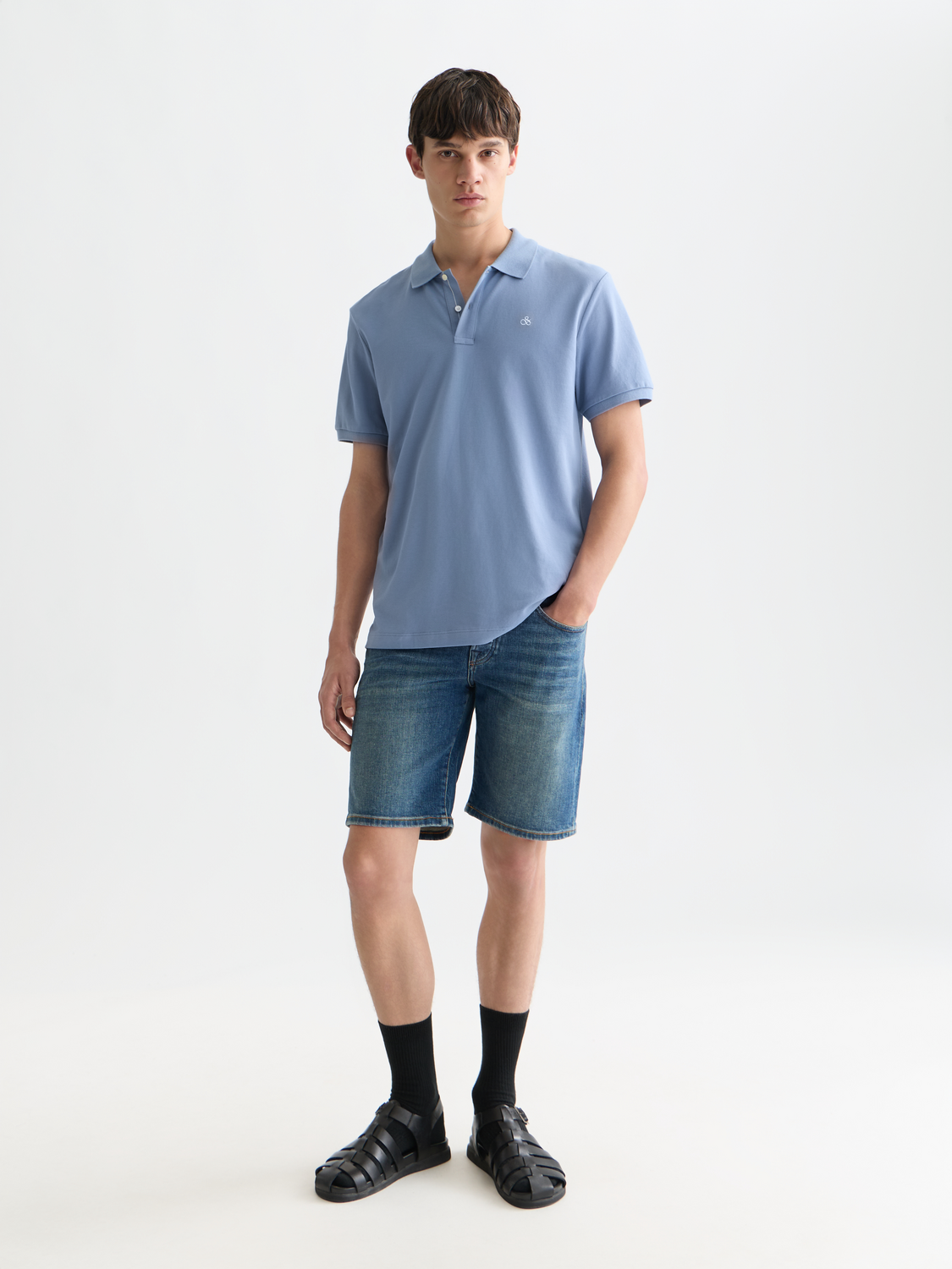 Navy logo pique polo shirt by Scotch & Soda featuring a classic collar and short sleeves.