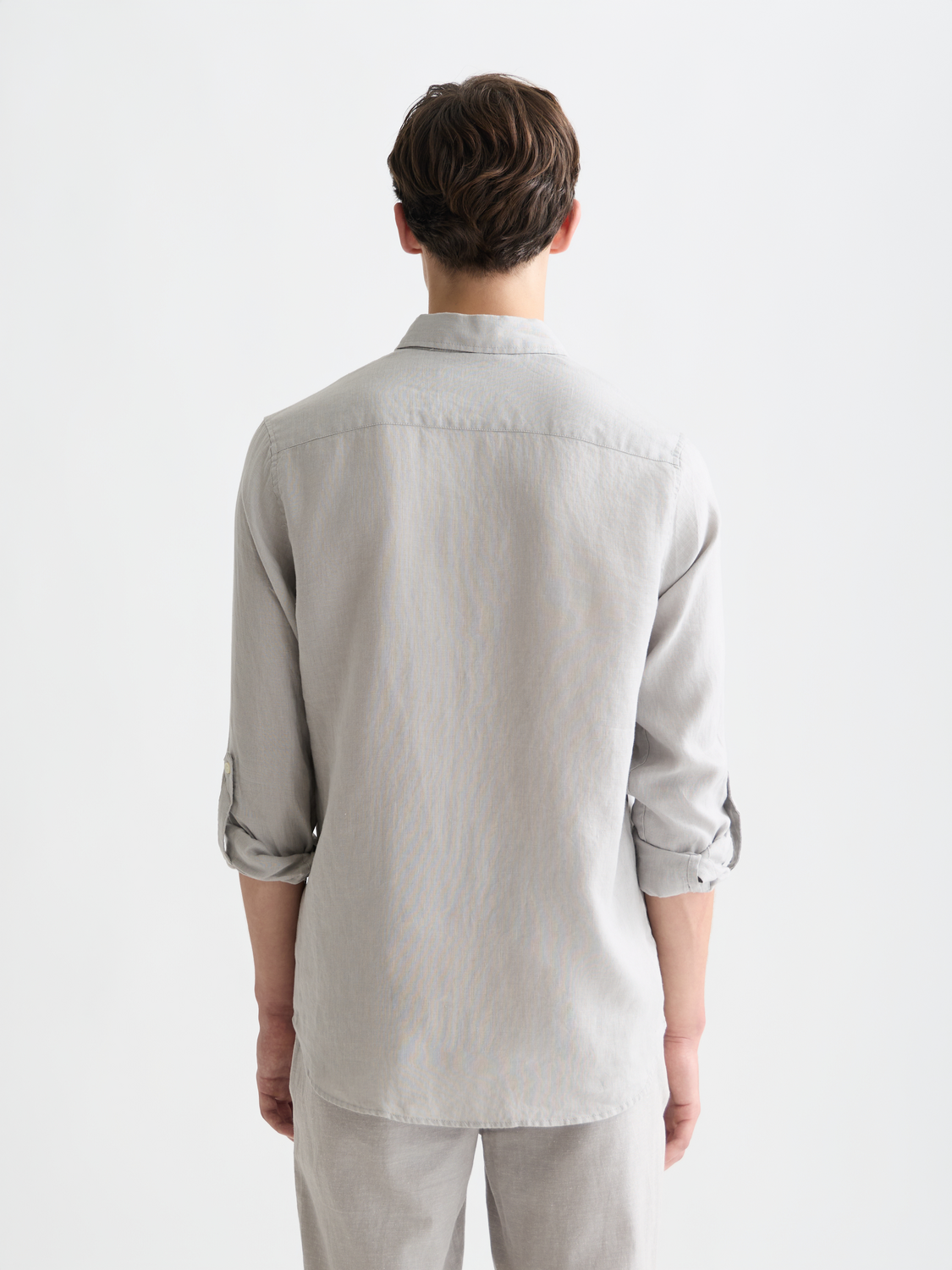 Light blue Scotch & Soda linen long-sleeve shirt with a relaxed fit, shown from the back with a classic collar and button details.