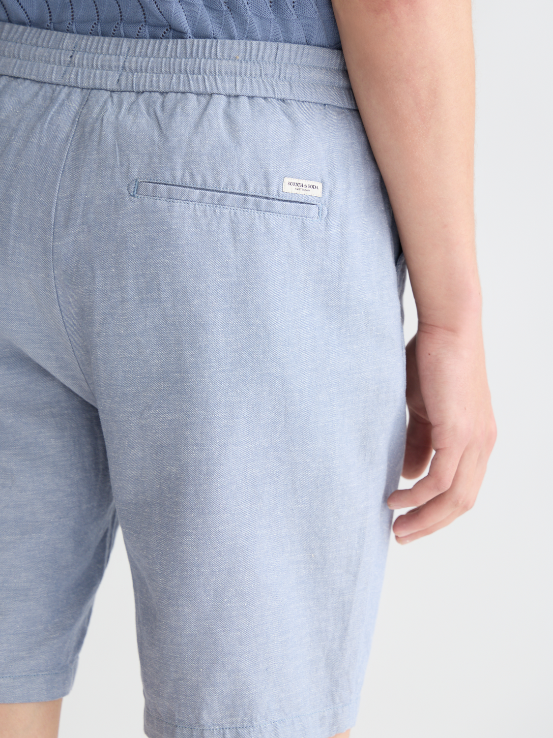 Light beige Fave cotton-linen shorts by Scotch & Soda featuring a relaxed fit and casual style.