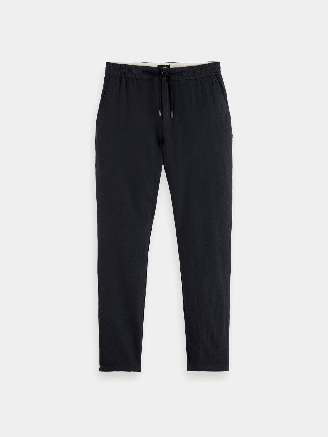 SCOTCH & SODA Warren joggers pants in black, featuring a relaxed fit and casual style, with elastic waist and tapered legs.