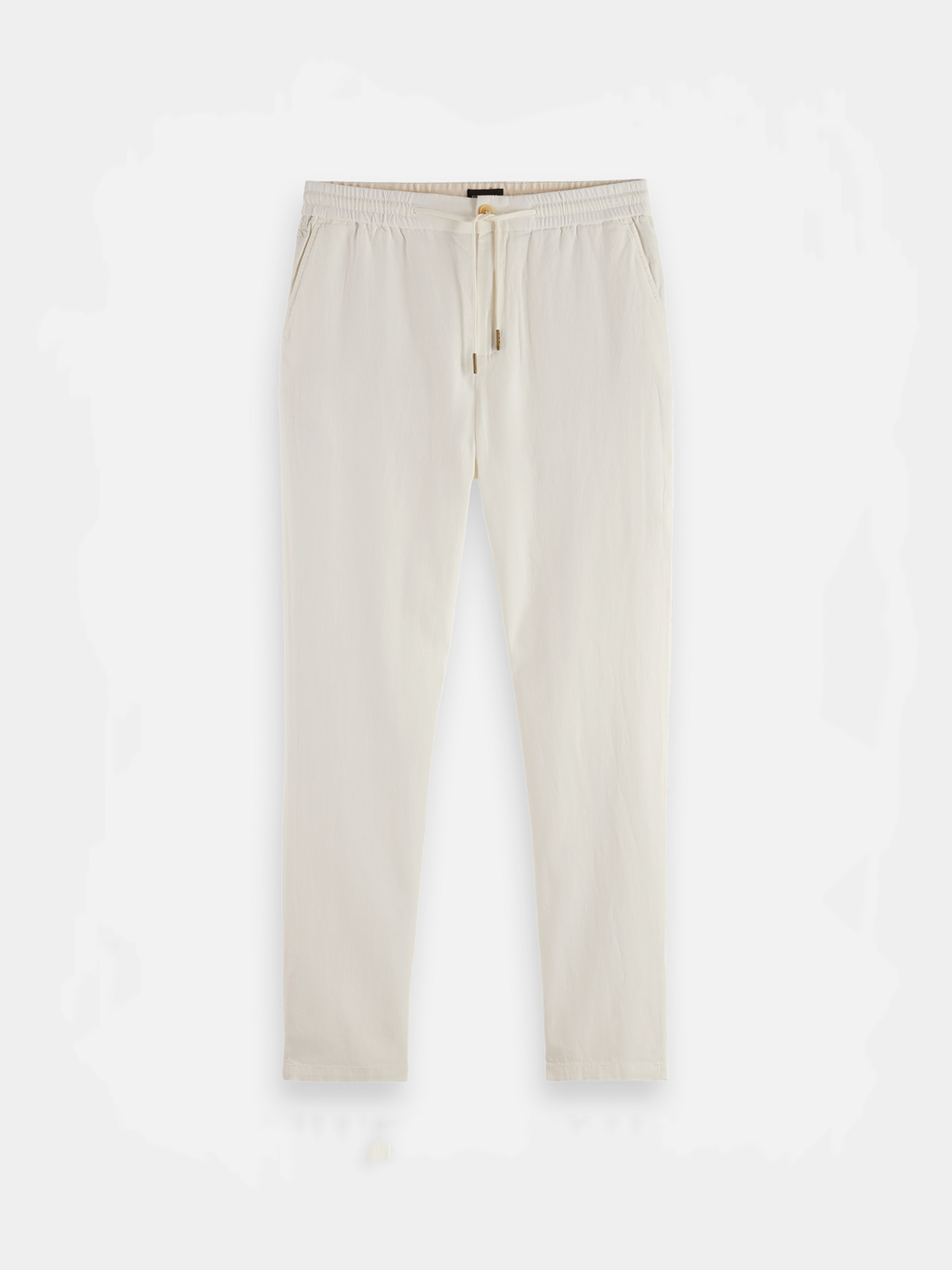 SCOTCH & SODA Warren joggers pants in black, featuring a relaxed fit and elastic waistband, shown on a model.