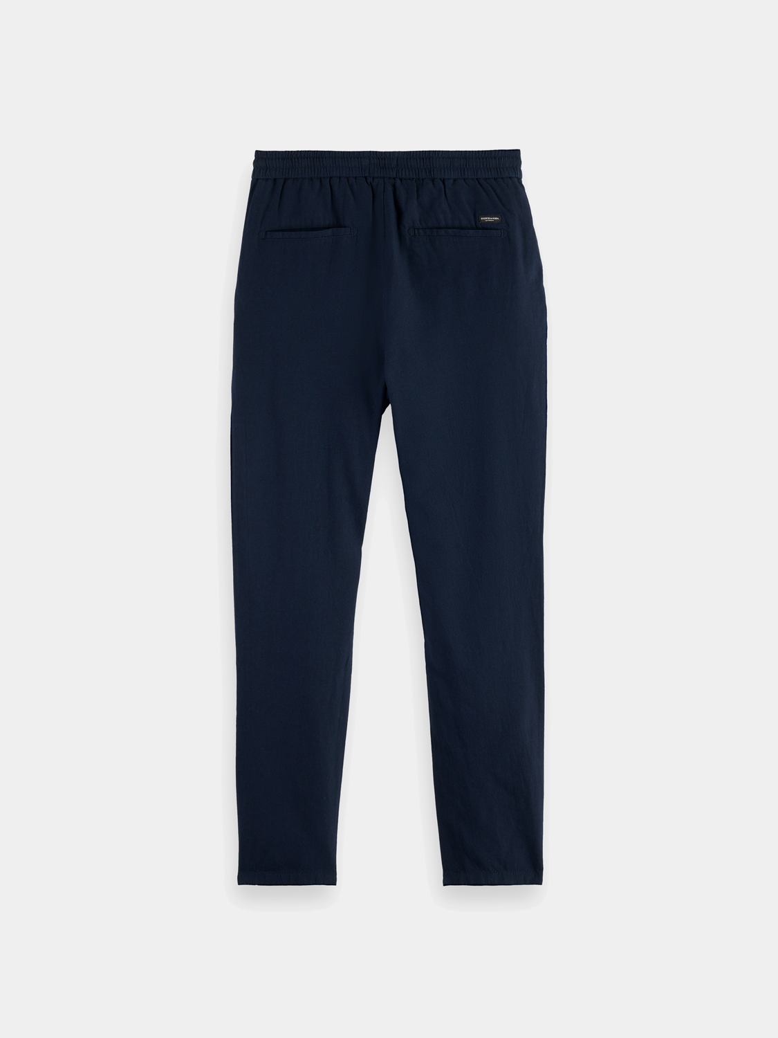 Black Warren joggers by Scotch & Soda, casual men's pants with a relaxed fit and comfortable waistband, shown on a plain background.