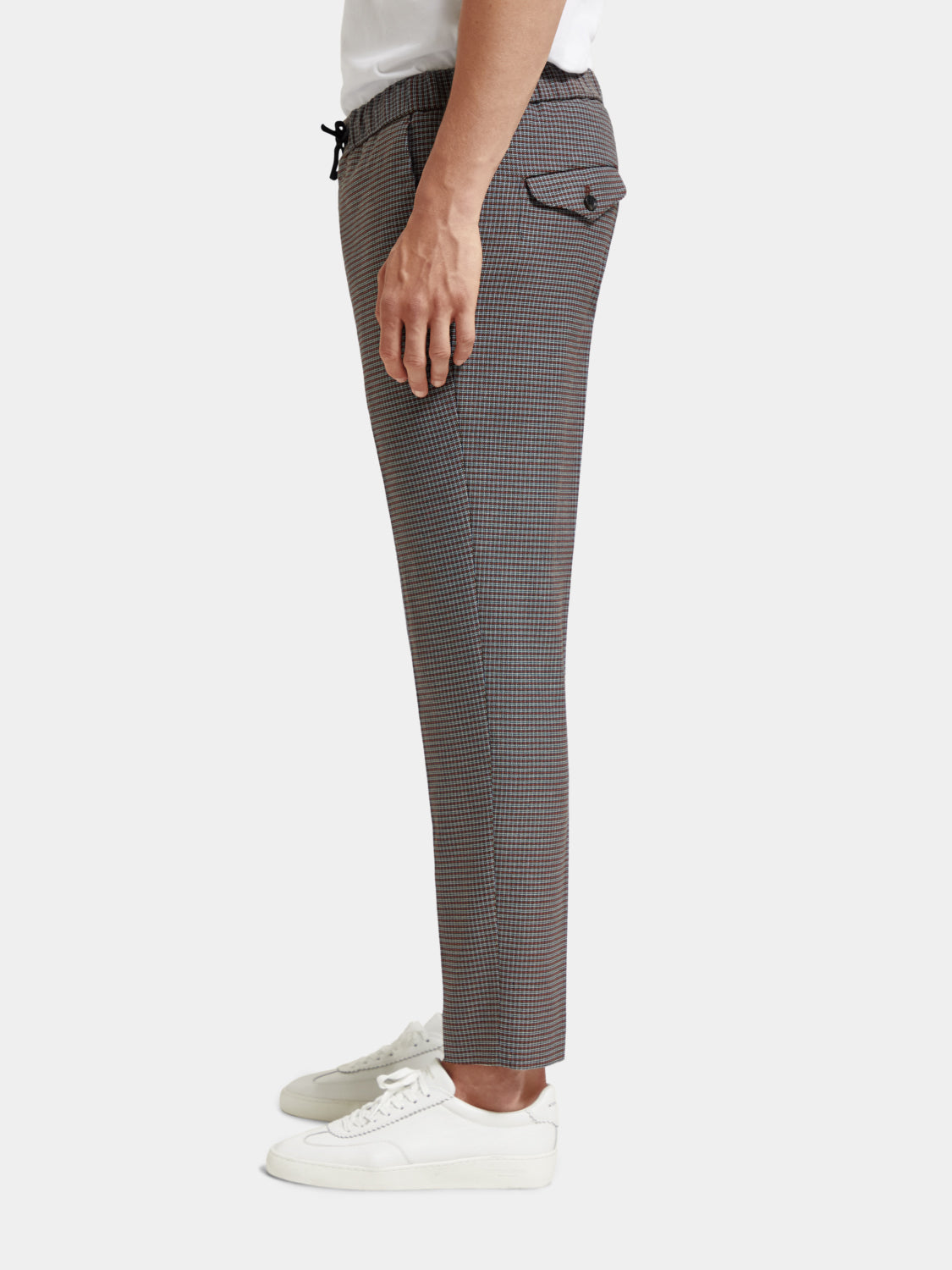 SCOTCH & SODA Finch tapered fit pants shown in dark fabric with a slim silhouette and classic five-pocket design.
