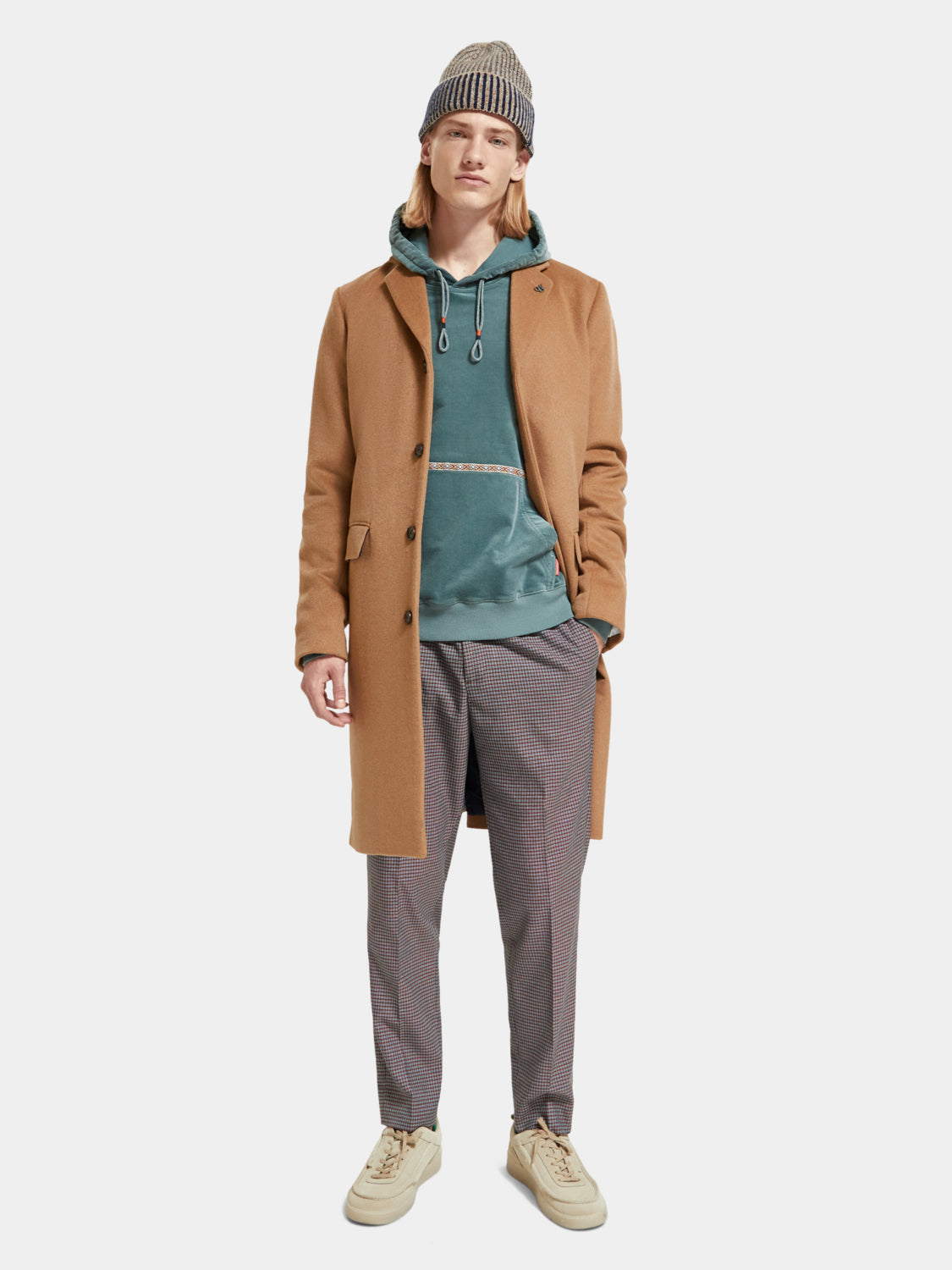 Finch tapered fit pants by Scotch & Soda, showcasing slim, modern design with a tailored fit in a neutral color.