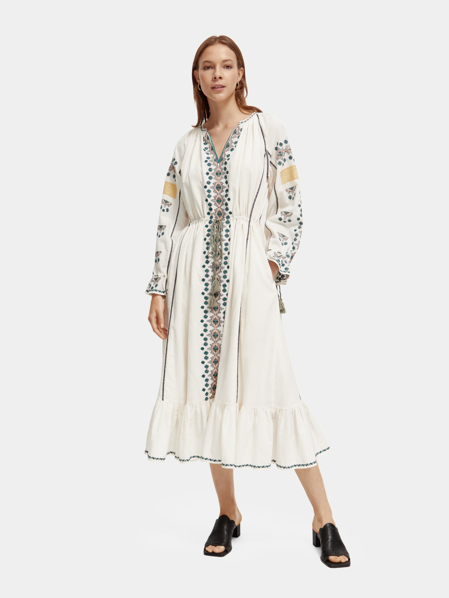 Embroidered v-neck maxi dress by SCOTCH & SODA featuring floral embroidery and flowing fabric, perfect for summer occasions.