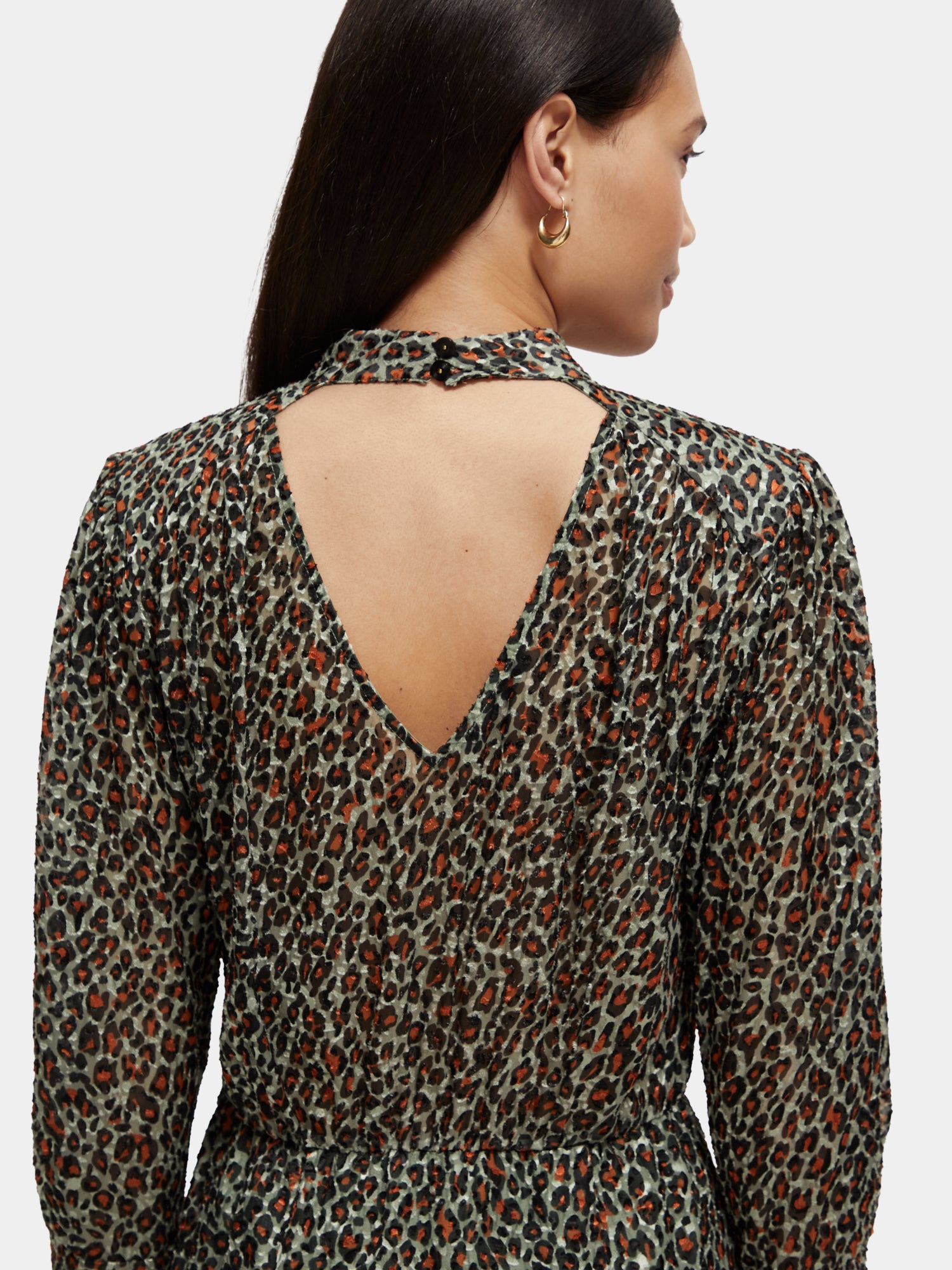 Black mock neck mini dress by Scotch & Soda, fitted dress with long sleeves and stylish silhouette.
