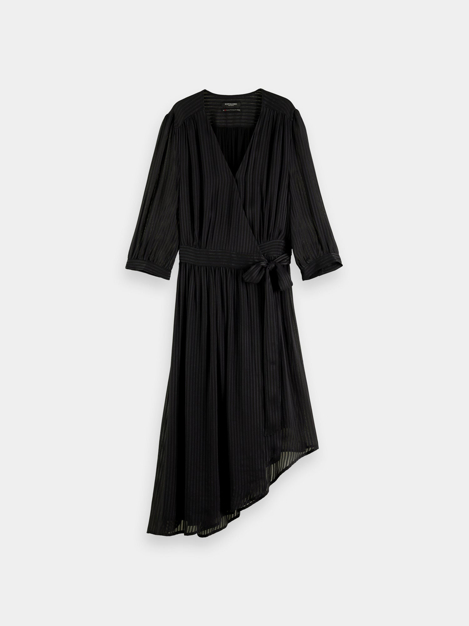 V-neck midi dress by Scotch & Soda, featuring a flowing silhouette and stylish design, shown on a model.