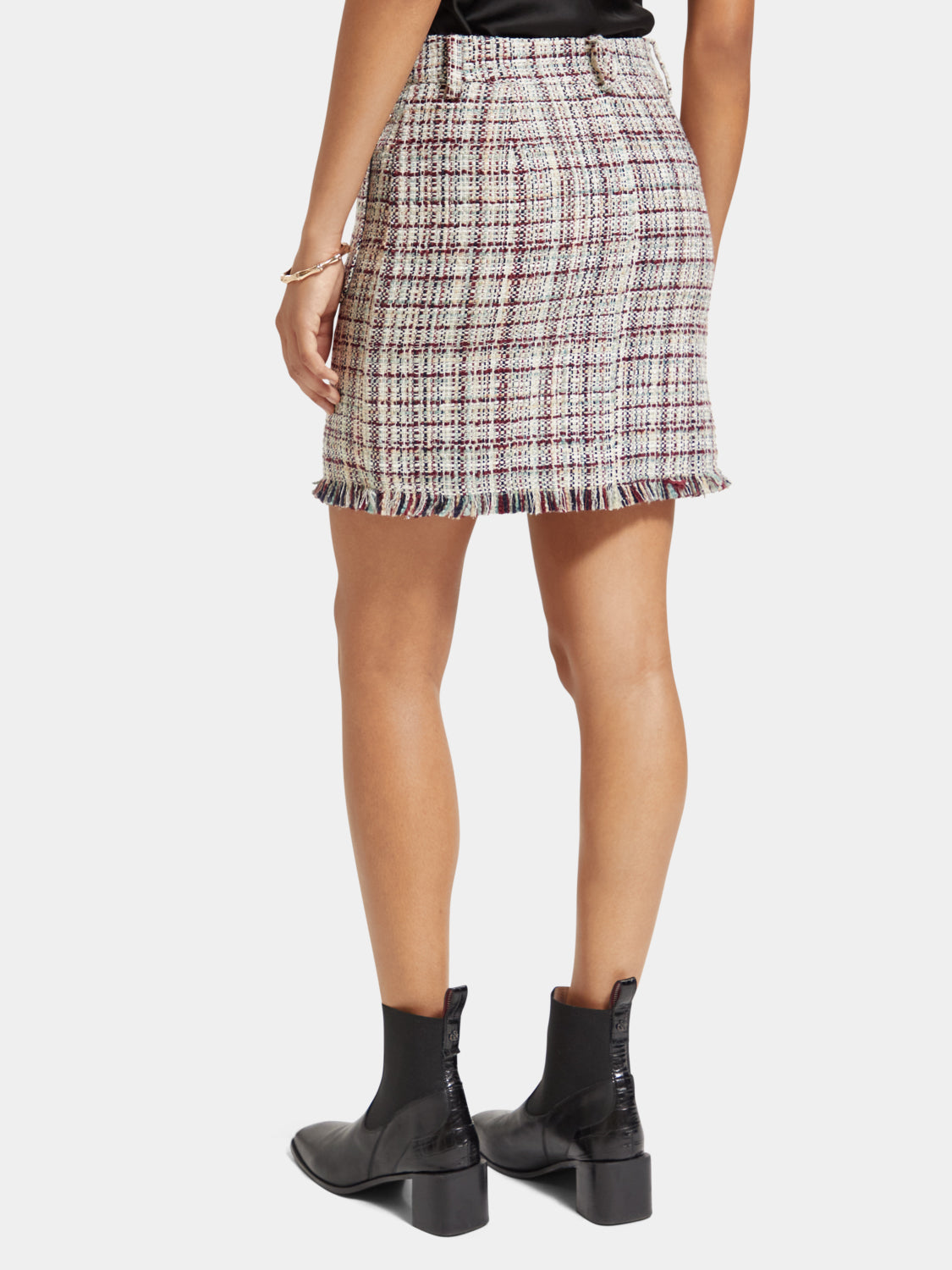 Scotch & Soda boucle tweed mini skirt with classic pattern, fitted waist, and textured fabric, stylish for casual or dressy wear.