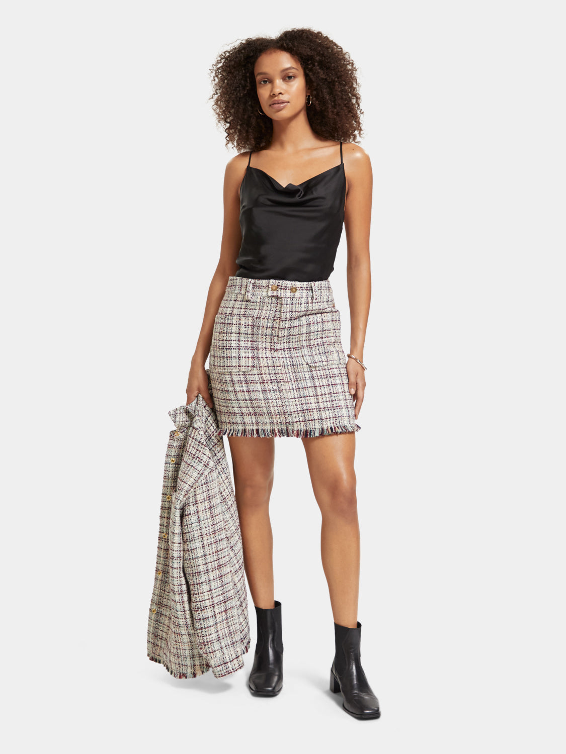 SCOTCH & SODA boucle tweed mini skirt with a textured pattern, high waist, and classic design, shown on a model.